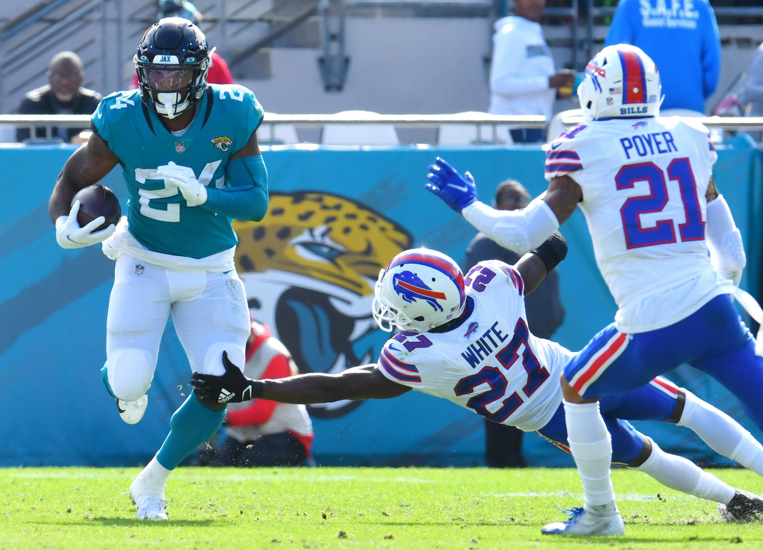 Buffalo Bills cornerback Tre'Davious White (27) tries to get a hand on Jacksonville Jaguars running back Carlos Hyde (24) during second quarter action. The Jaguars were tied with the Bills 6 to 6 at the end of the first half. The Jacksonville Jaguars hosted the Buffalo Bills at TIAA Bank Field in Jacksonville, FL, Sunday, November 7, 2021. [Bob Self/Florida Times-Union] Jki 110721 Bsjagsvsbuffalo 23