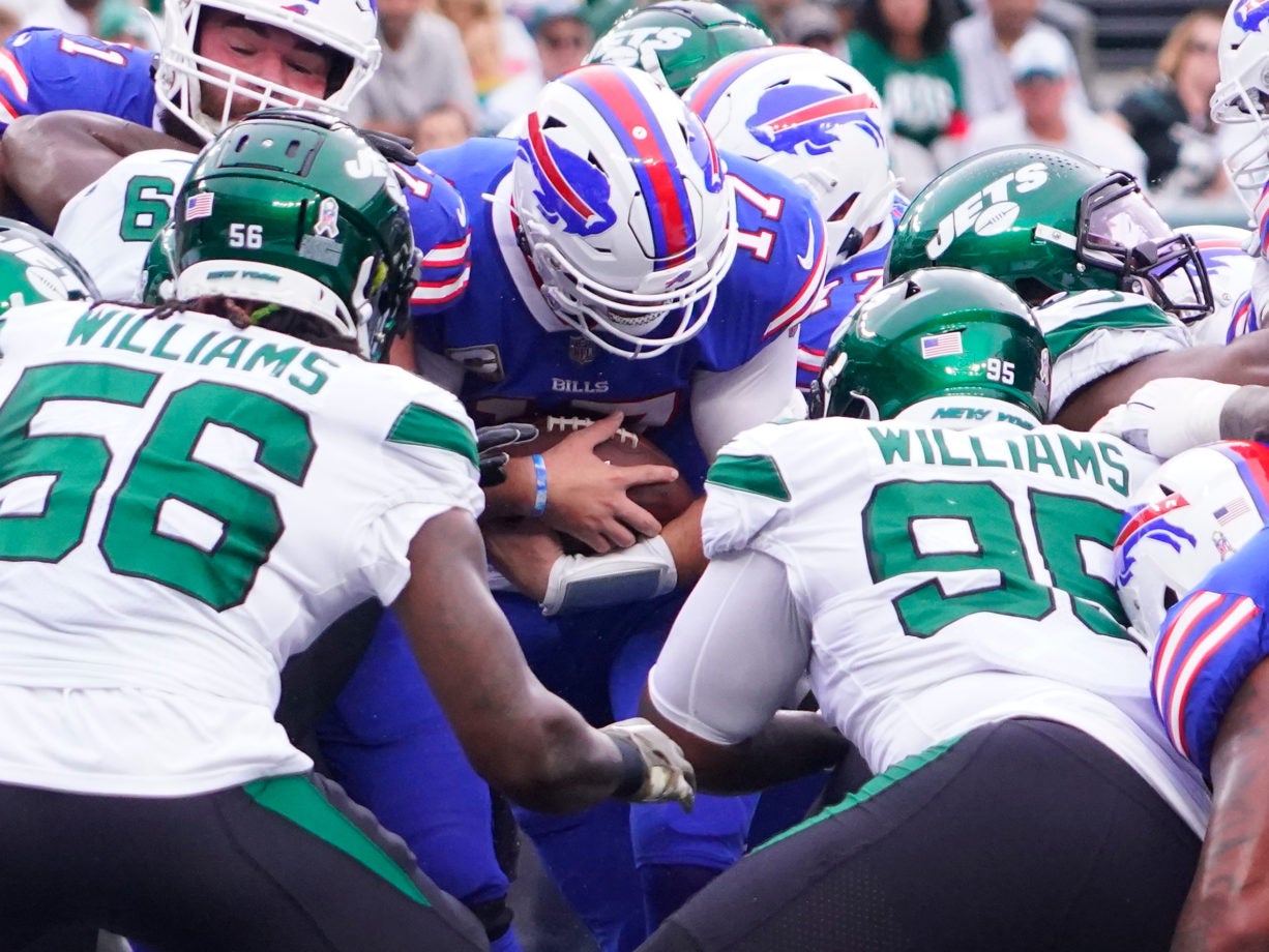 Nov 6, 2022; East Rutherford, NJ, USA; Buffalo Bills quarterback Josh Allen (17) scores a first quarter touchdown on a keeper as the New York Jets are unable to stop him at MetLife Stadium. Mandatory Credit: Robert Deutsch-USA TODAY Sports