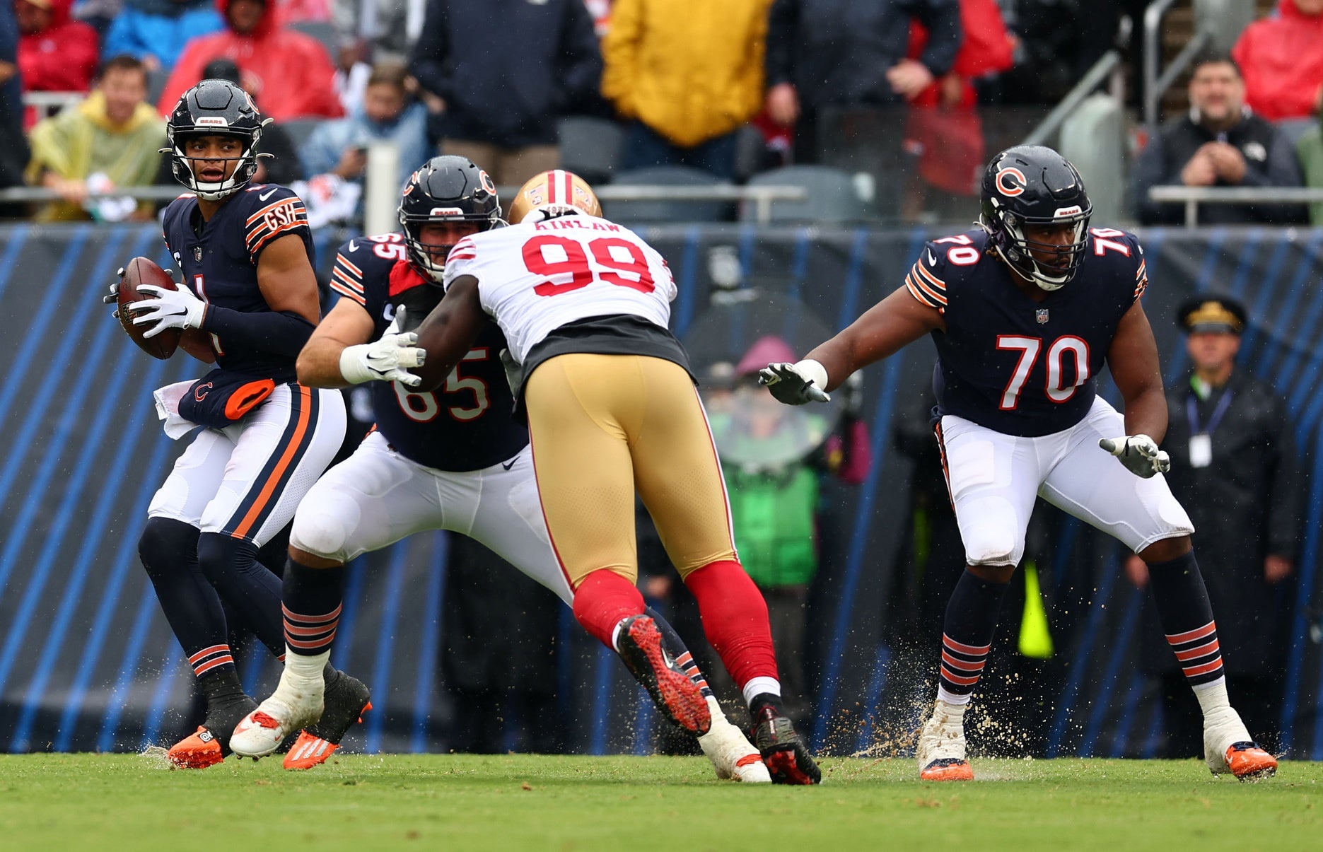 Sep 11, 2022; Chicago, Illinois, USA; Chicago Bears quarterback Justin Fields (1) drops back to pass against the San Francisco 49ers during the first quarter at Soldier Field. Mandatory Credit: Mike Dinovo-USA TODAY Sports