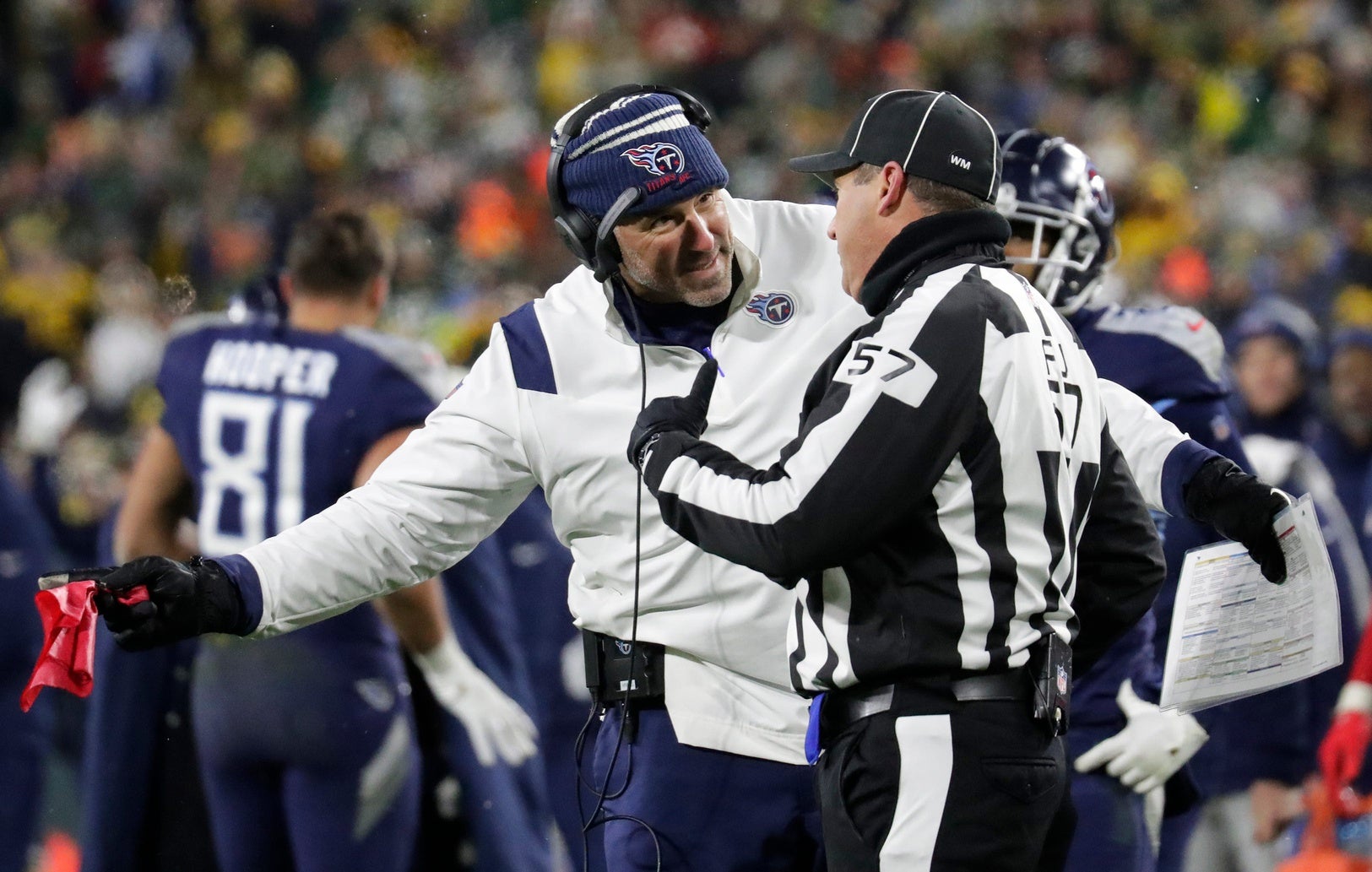 Tennessee Titans head coach Mike Vrabel talks with an official to get an incomplete pass changed to a touchdown call in the fourth quarter against the Green Bay Packers during their football game Thursday, November 17, at Lambeau Field in Green Bay, Wis. Credit: Dan Powers/USA TODAY NETWORK-Wisconsin