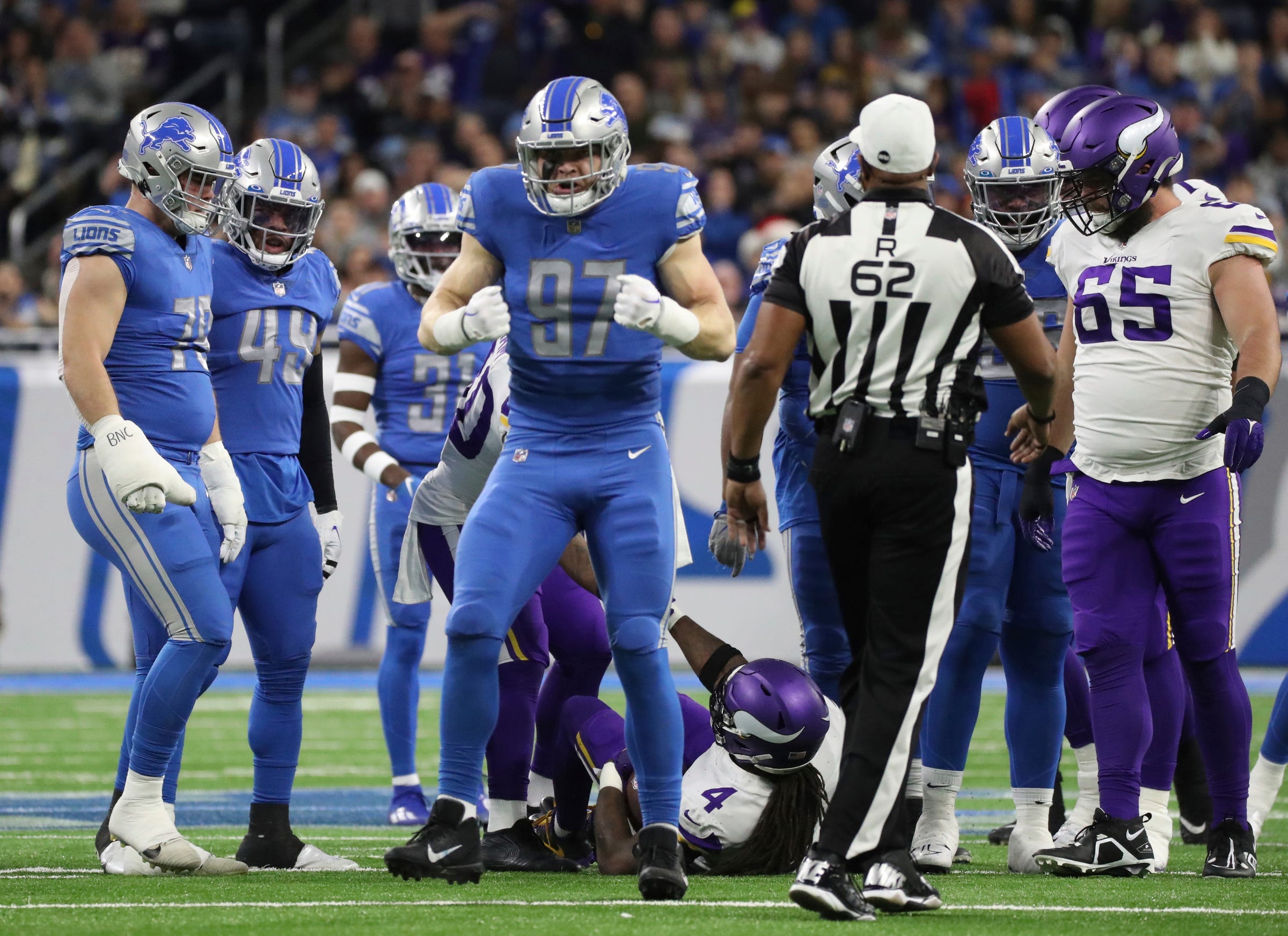 Lions defensive end Aidan Hutchinson celebrates after tackling Vikings running back Dalvin Cook during the first half of the Lions' 34-23 win over the Vikings on Sunday, Dec. 11, 2022, at Ford Field. Lionsminn 121122 Kd 3820