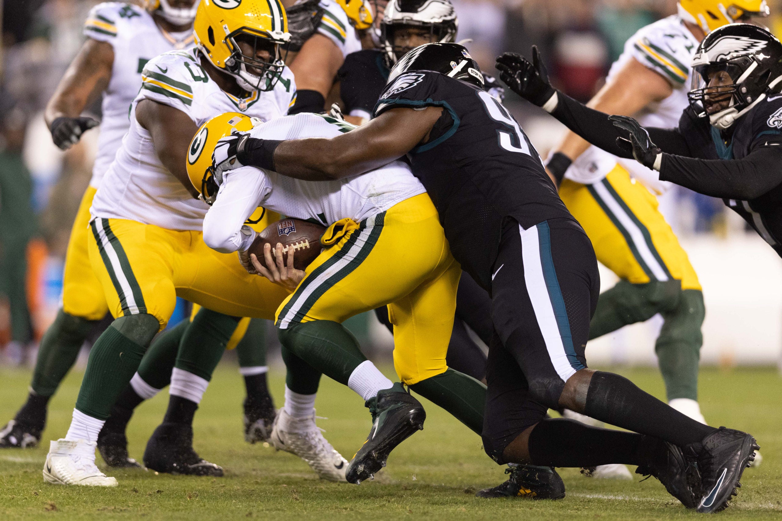 Nov 27, 2022; Philadelphia, Pennsylvania, USA; Philadelphia Eagles defensive tackle Fletcher Cox (91) sacks Green Bay Packers quarterback Aaron Rodgers (12) during the second quarter at Lincoln Financial Field. Mandatory Credit: Bill Streicher-USA TODAY Sports