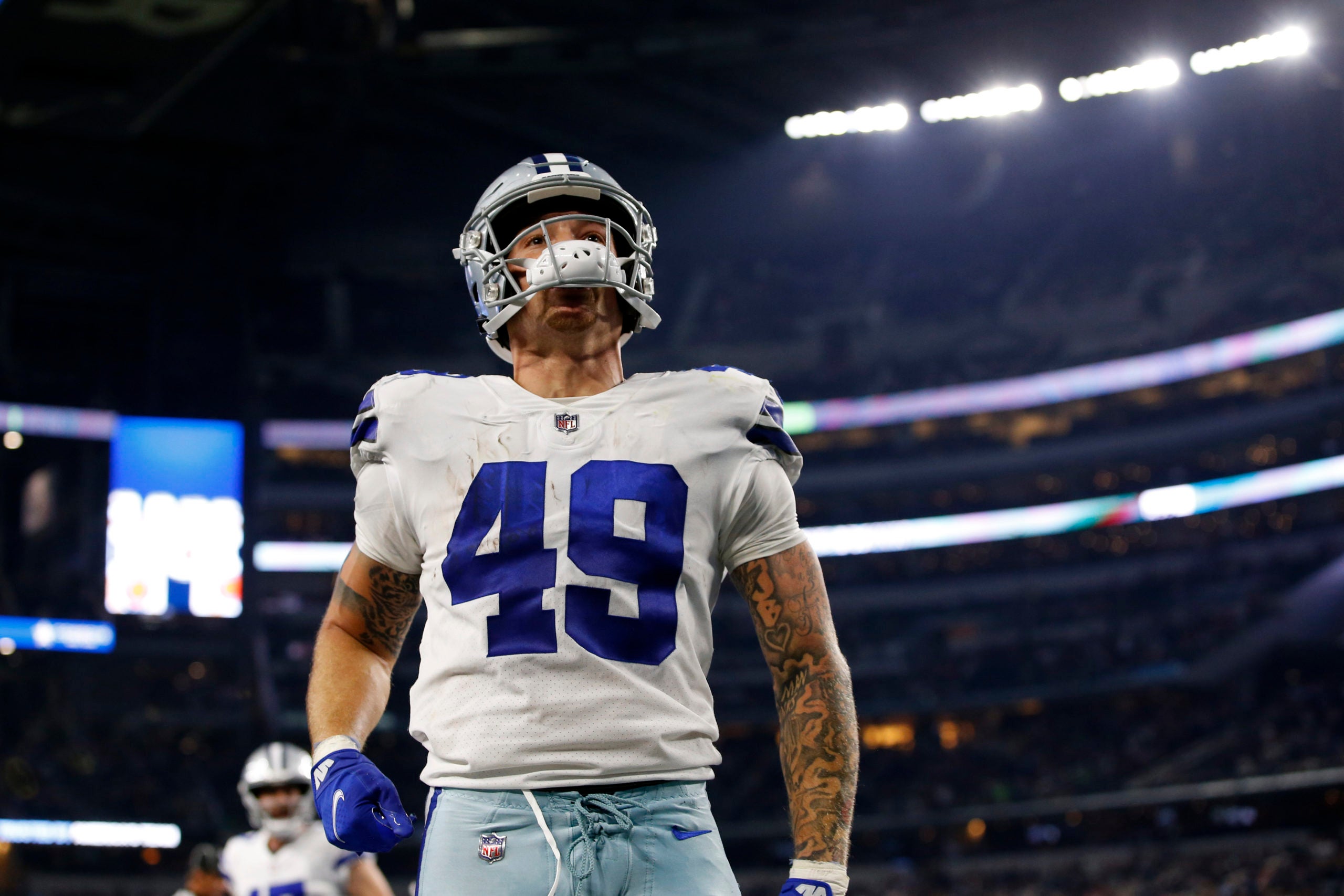 Aug 26, 2022; Arlington, Texas, USA; Dallas Cowboys tight end Peyton Hendershot (49) reacts after scoring a touchdown against the Seattle Seahawks in the fourth quarter at AT&T Stadium. Mandatory Credit: Tim Heitman-USA TODAY Sports