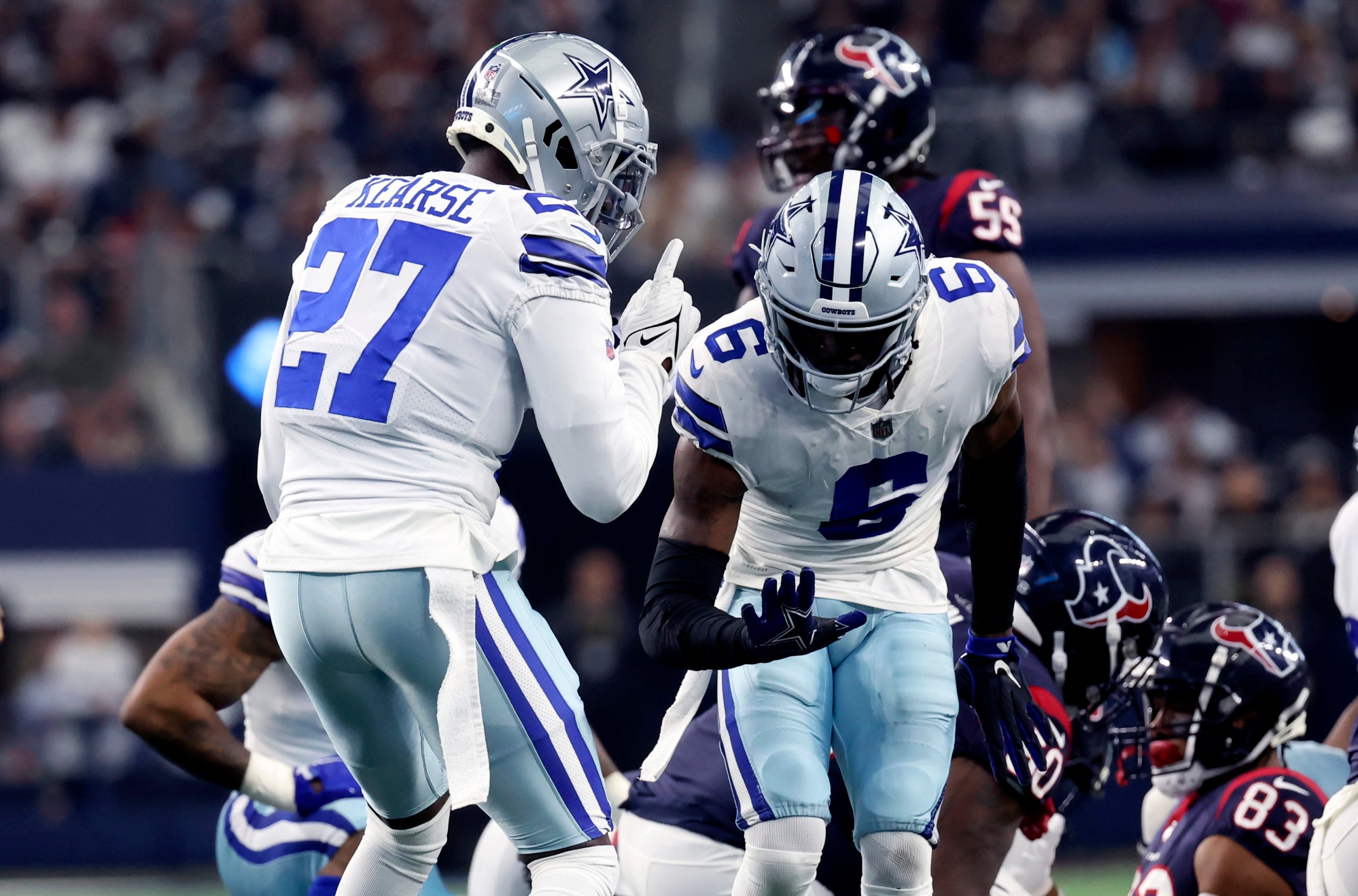 Dec 11, 2022; Arlington, Texas, USA;  Dallas Cowboys safety Donovan Wilson (6) and Dallas Cowboys safety Jayron Kearse (27) react during the first quarter against the Houston Texans at AT&T Stadium. Mandatory Credit: Kevin Jairaj-USA TODAY Sports