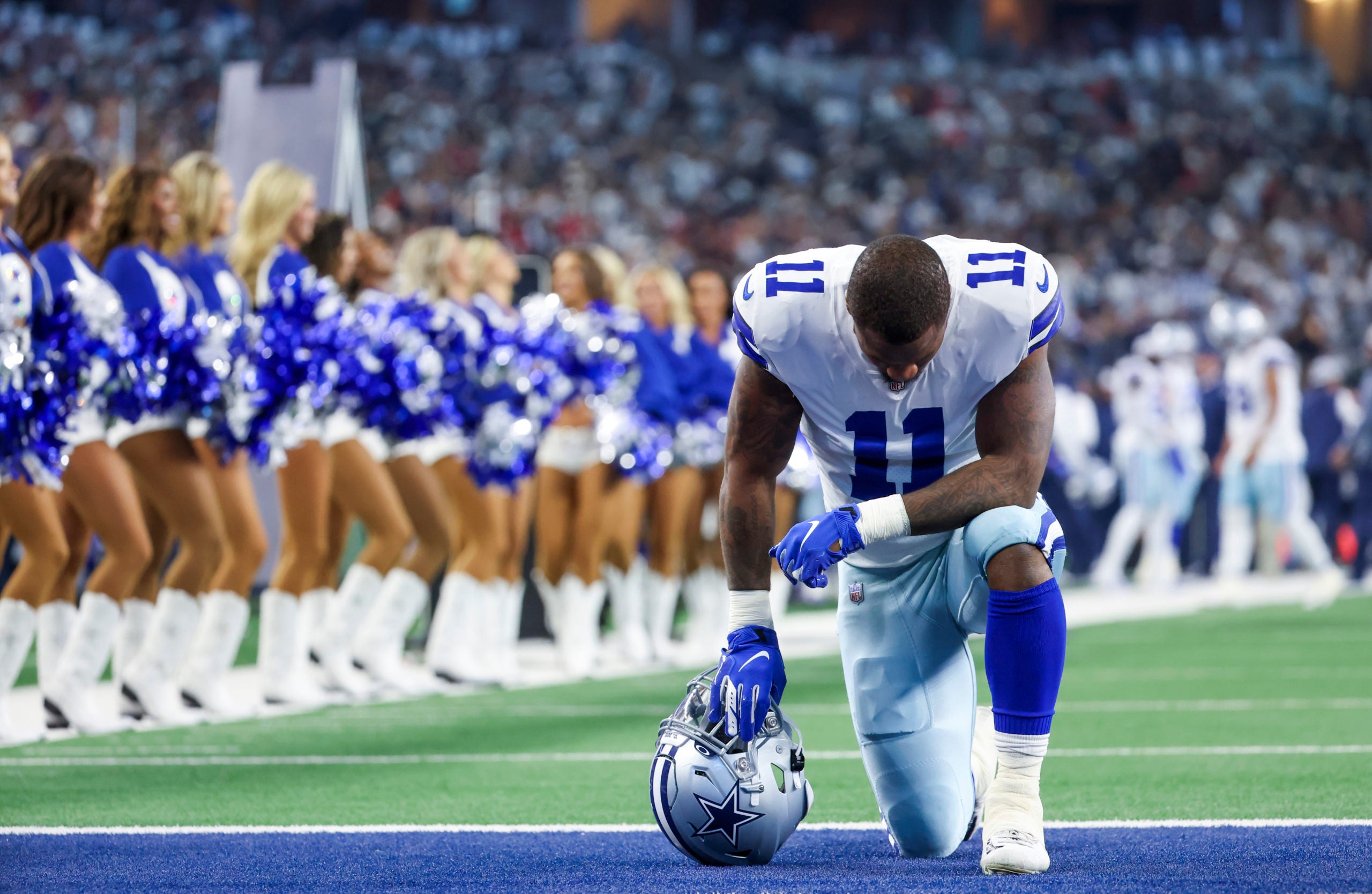 Sep 11, 2022; Arlington, Texas, USA;  Dallas Cowboys linebacker Micah Parsons (11) prays before the game against the Tampa Bay Buccaneers at AT&T Stadium. Mandatory Credit: Kevin Jairaj-USA TODAY Sports