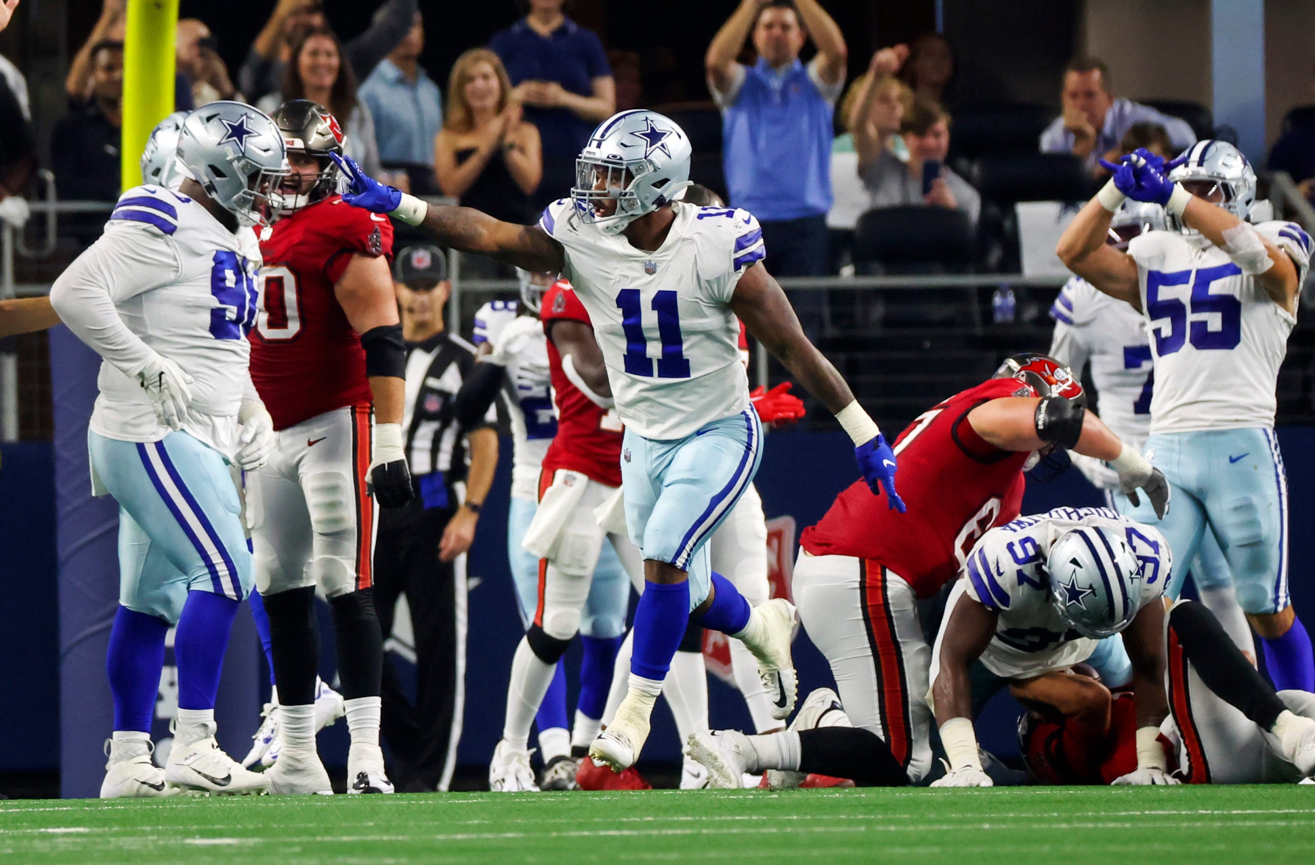 Sep 11, 2022; Arlington, Texas, USA; Dallas Cowboys linebacker Micah Parsons (11) reacts after recording a sack during the second quarter against the Tampa Bay Buccaneers at AT&T Stadium. Mandatory Credit: Kevin Jairaj-USA TODAY Sports