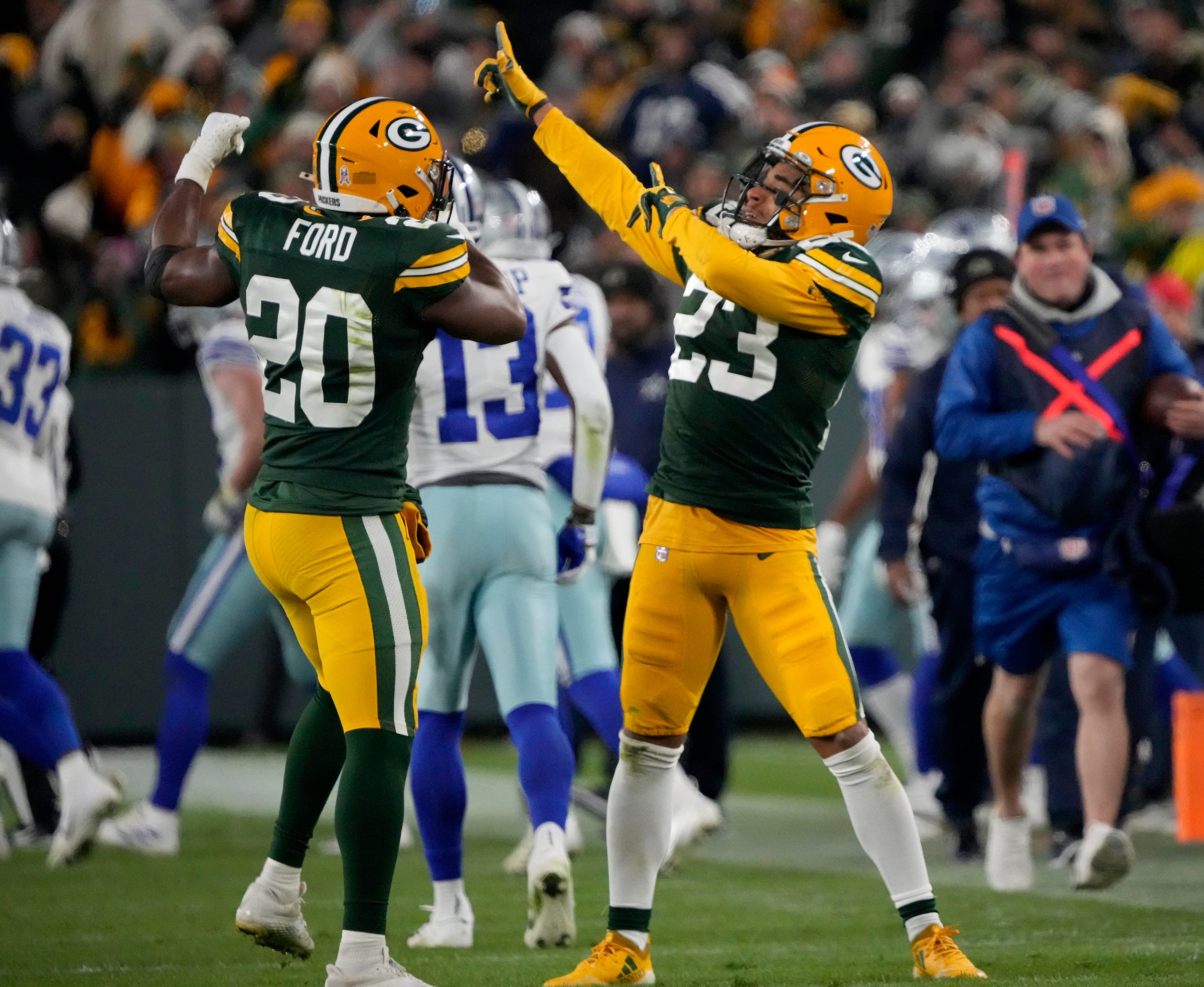 Green Bay Packers cornerback Jaire Alexander (23) celebrates a stop during the second half of their 31-28 overtime win against the Dallas Cowboys on Sunday, Nov. 13, 2022 at Lambeau Field in Green Bay. Packers Cowboys Packers14 4034