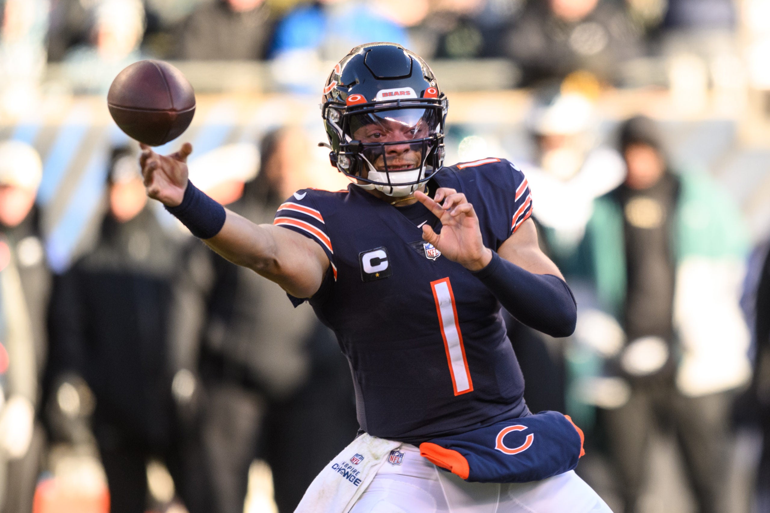 Dec 18, 2022; Chicago, Illinois, USA; Chicago Bears quarterback Justin Fields (1) passes the ball in the third quarter against the Philadelphia Eagles at Soldier Field. Mandatory Credit: Daniel Bartel-USA TODAY Sports