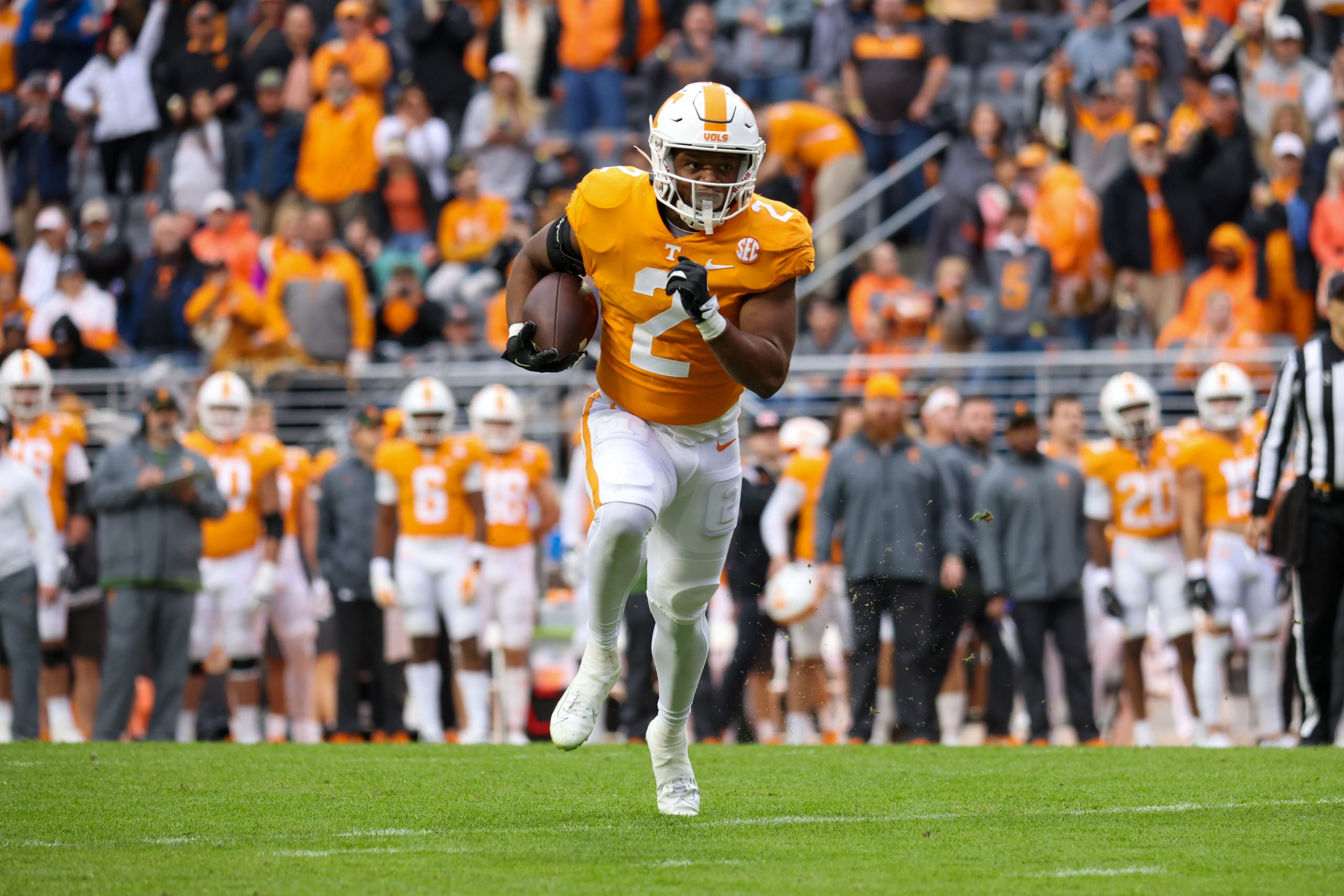 Nov 12, 2022; Knoxville, Tennessee, USA; Tennessee Volunteers running back Jabari Small (2) runs for a touchdown against the Missouri Tigers in the first quarter at Neyland Stadium. Mandatory Credit: Randy Sartin-USA TODAY Sports