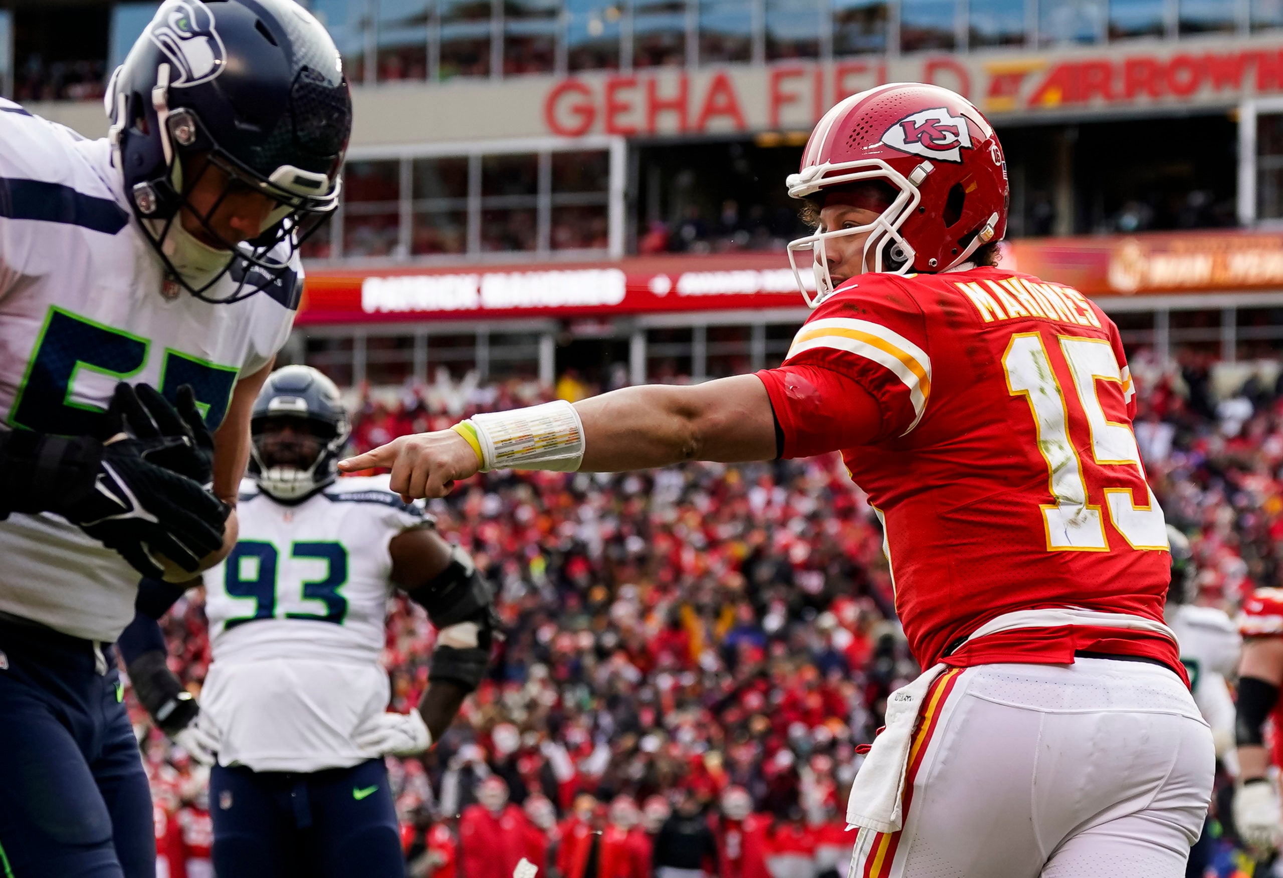 Dec 24, 2022; Kansas City, Missouri, USA; Kansas City Chiefs quarterback Patrick Mahomes (15) reacts after scoring a touchdown during the second half against the Seattle Seahawks at GEHA Field at Arrowhead Stadium. Mandatory Credit: Jay Biggerstaff-USA TODAY Sports