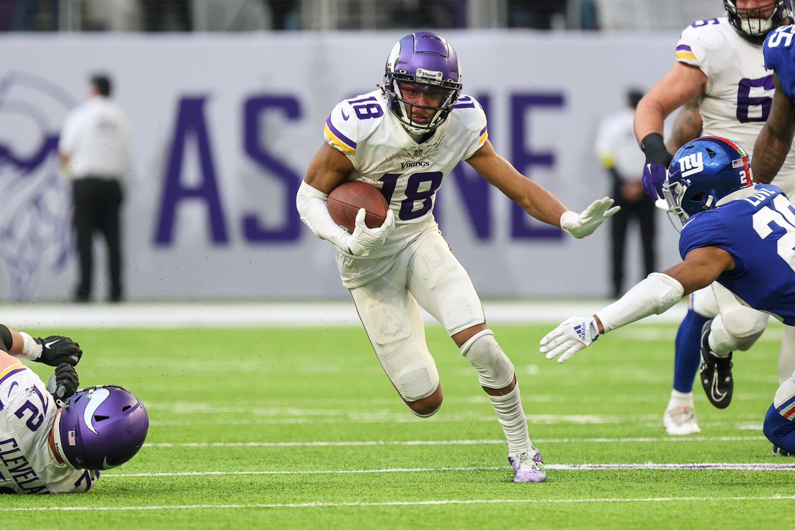 Dec 24, 2022; Minneapolis, Minnesota, USA; Minnesota Vikings wide receiver Justin Jefferson (18) runs after a catch against the New York Giants during the fourth quarter at U.S. Bank Stadium. Mandatory Credit: Matt Krohn-USA TODAY Sports
