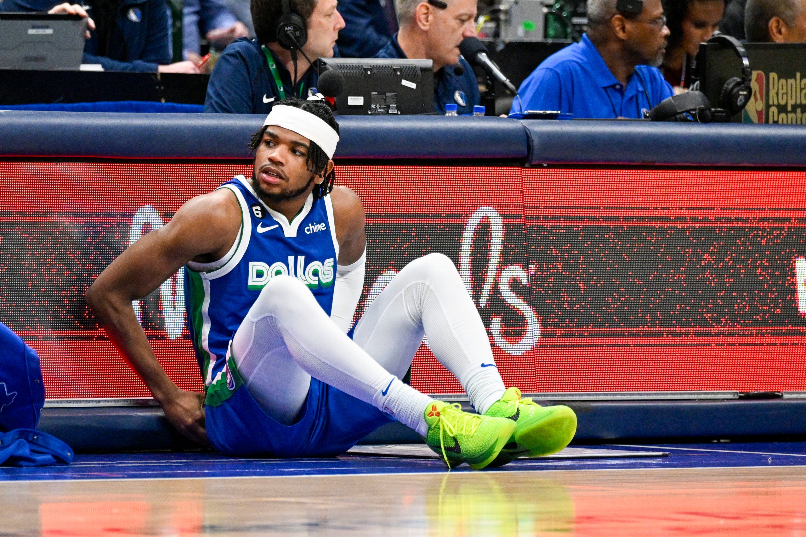 Jaden Hardy sits at the scorers table, waiting to check in.