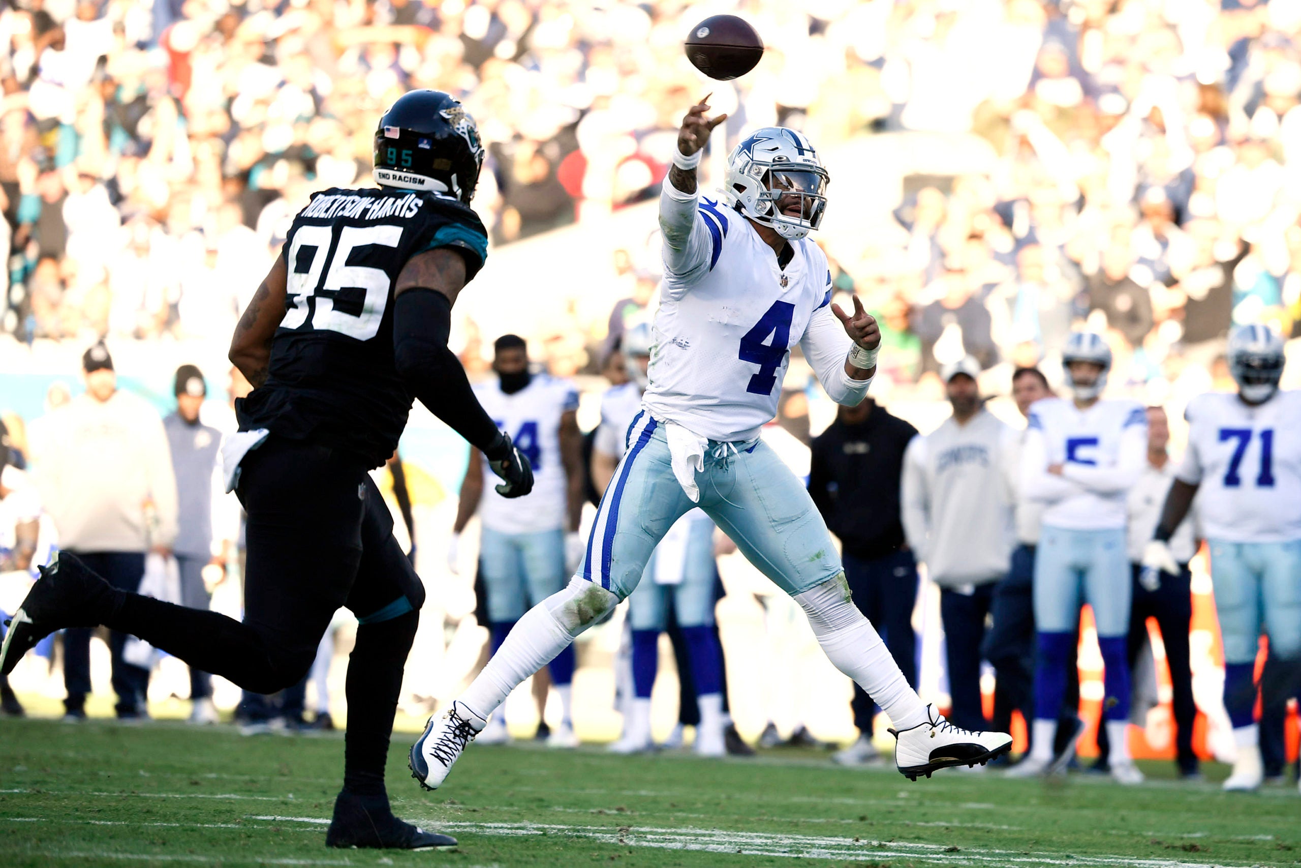 Dec 18, 2022; Jacksonville, Florida, USA; Dallas Cowboys quarterback Dak Prescott (4) throws the ball during the second half against the Jacksonville Jaguars at TIAA Bank Field. Mandatory Credit: Melina Myers-USA TODAY Sports