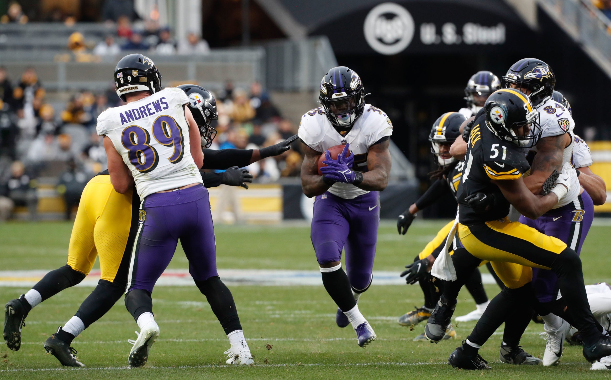 Dec 11, 2022; Pittsburgh, Pennsylvania, USA;  Baltimore Ravens running back Gus Edwards (35) runs the ball against the Pittsburgh Steelers during the fourth quarter at Acrisure Stadium. Mandatory Credit: Charles LeClaire-USA TODAY Sports