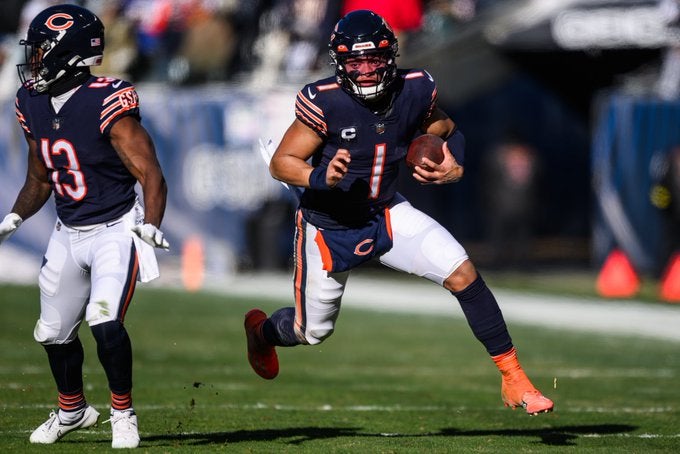 Chicago Bears Justin Fields Philadelphia Eagles rushing record QB quarterbacks Lamar Jackson Michael Vick NFL history football news stats