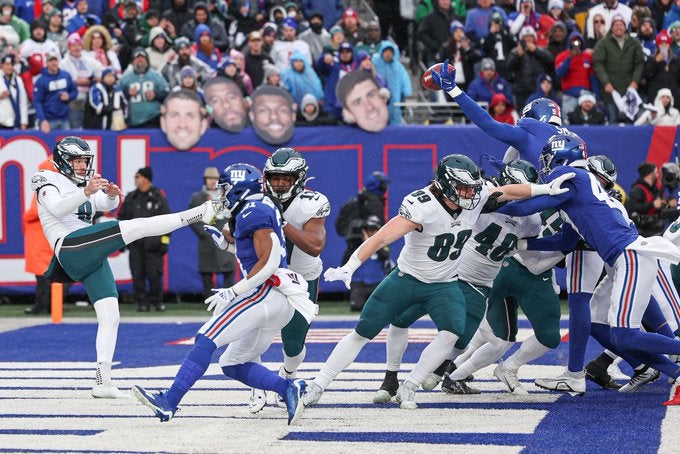 Philadelphia Eagles punter injury blocked punt Arryn Siposs Brett Kern Tennessee Titans New York Giants free agent NFL football news