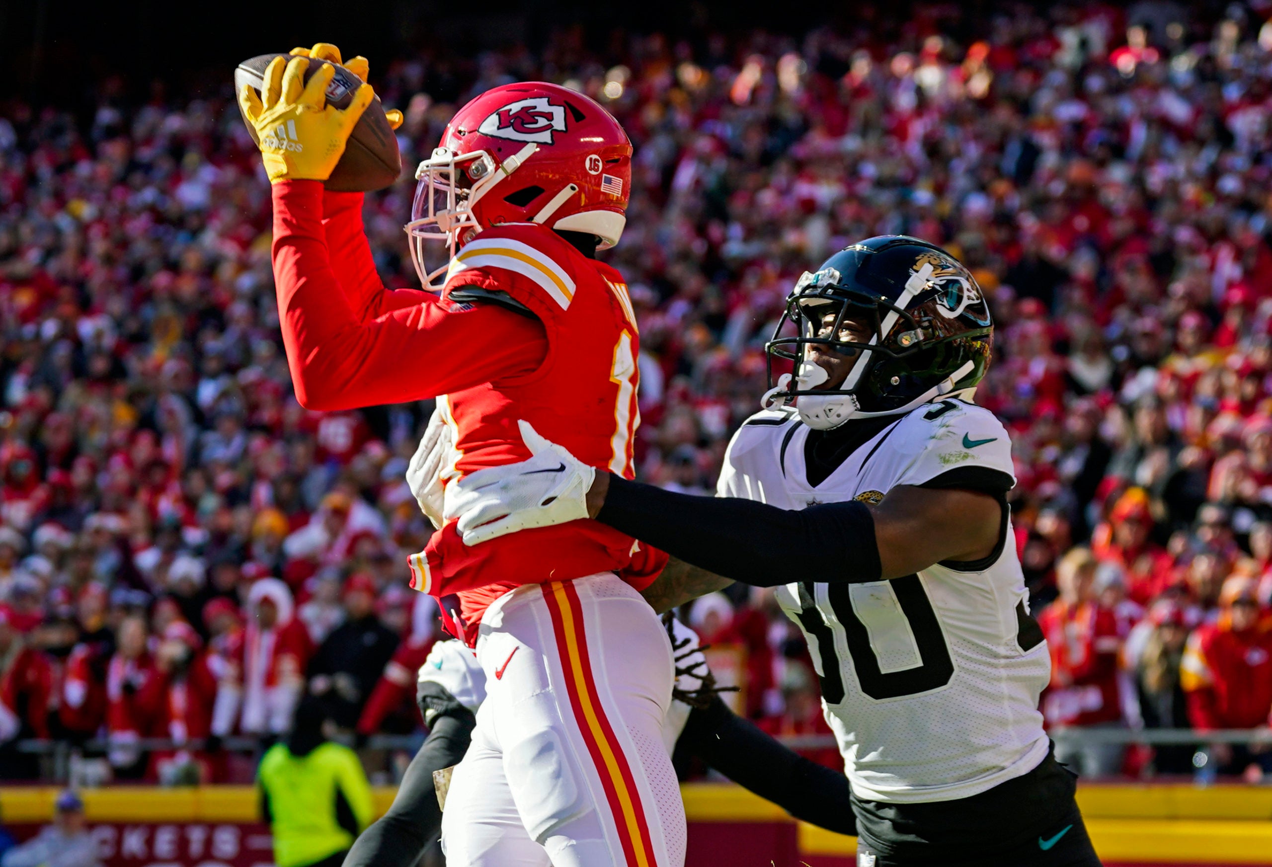 Nov 13, 2022; Kansas City, Missouri, USA; Kansas City Chiefs wide receiver Kadarius Toney (19) catches a pass against Jacksonville Jaguars cornerback Montaric Brown (30) during the second half at GEHA Field at Arrowhead Stadium. Mandatory Credit: Jay Biggerstaff-USA TODAY Sports