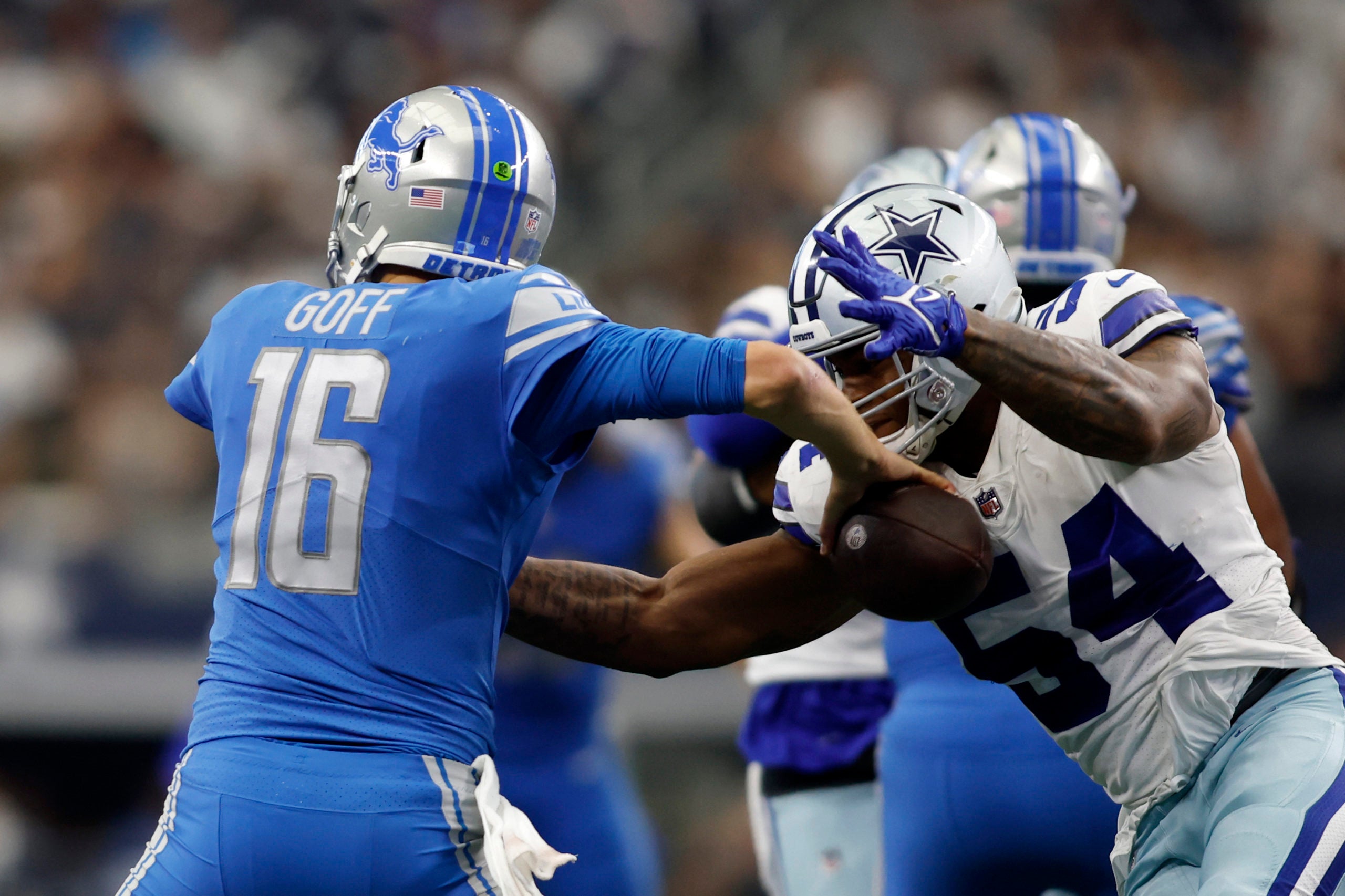 Oct 23, 2022; Arlington, Texas, USA; Dallas Cowboys defensive end Sam Williams (54) sacks and causes a fumble by Detroit Lions quarterback Jared Goff (16) and recovers it in the fourth quarter at AT&T Stadium. Mandatory Credit: Tim Heitman-USA TODAY Sports