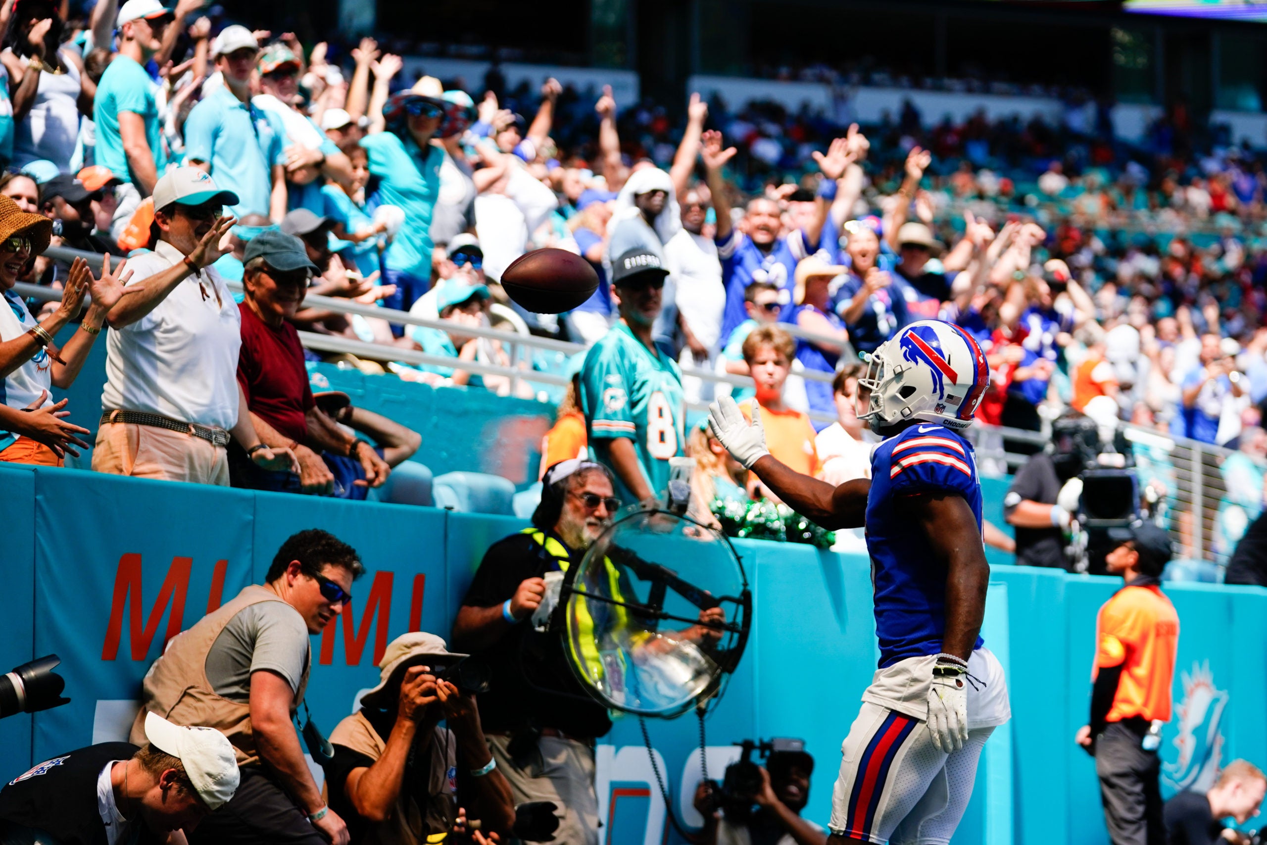 Sep 25, 2022; Miami Gardens, Florida, USA; Buffalo Bills wide receiver Isaiah McKenzie (6) throws the ball into the crowd after scoring a touch down against the Miami Dolphins during the second quarter at Hard Rock Stadium. Mandatory Credit: Rich Storry-USA TODAY Sports