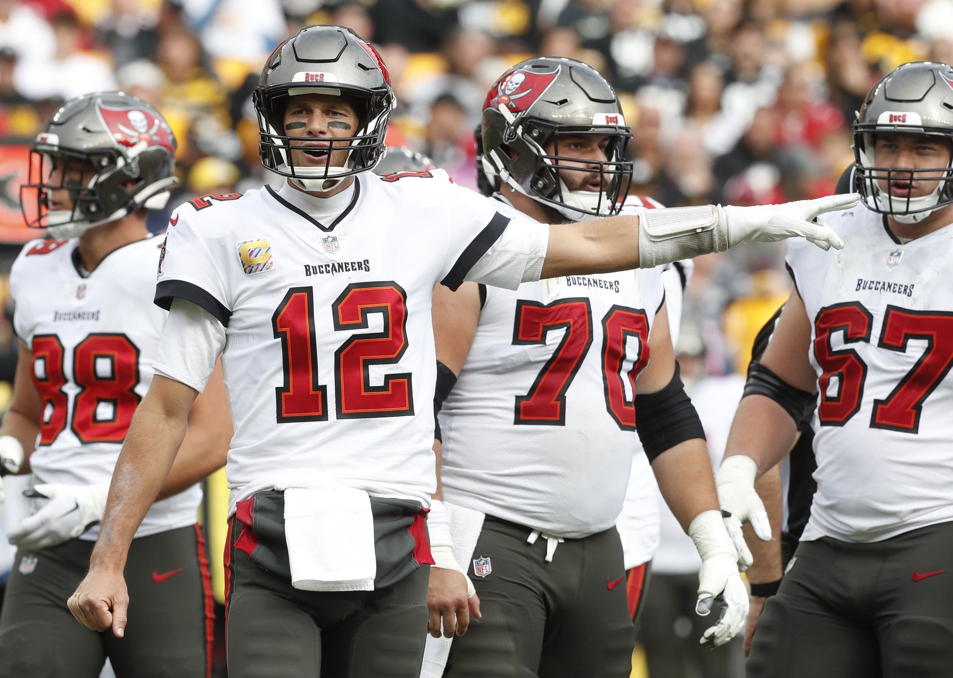 Oct 16, 2022; Pittsburgh, Pennsylvania, USA;  Tampa Bay Buccaneers quarterback Tom Brady (12) signals a penalty against the Pittsburgh Steelers during the fourth quarter at Acrisure Stadium. Pittsburgh won 20-18. Mandatory Credit: Charles LeClaire-USA TODAY Sports