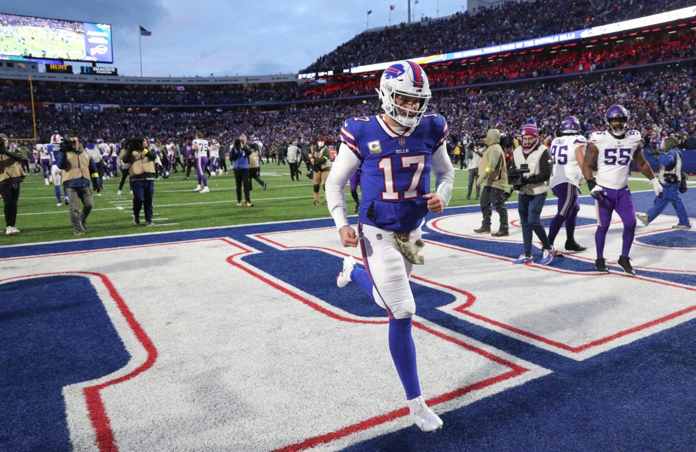 Bills quarterback Josh Allen runs off the field after throwing an interception in the end zone during overtime to lose 33-30 to the Vikings Ag3i9087© JAMIE GERMANO / USA TODAY NETWORK