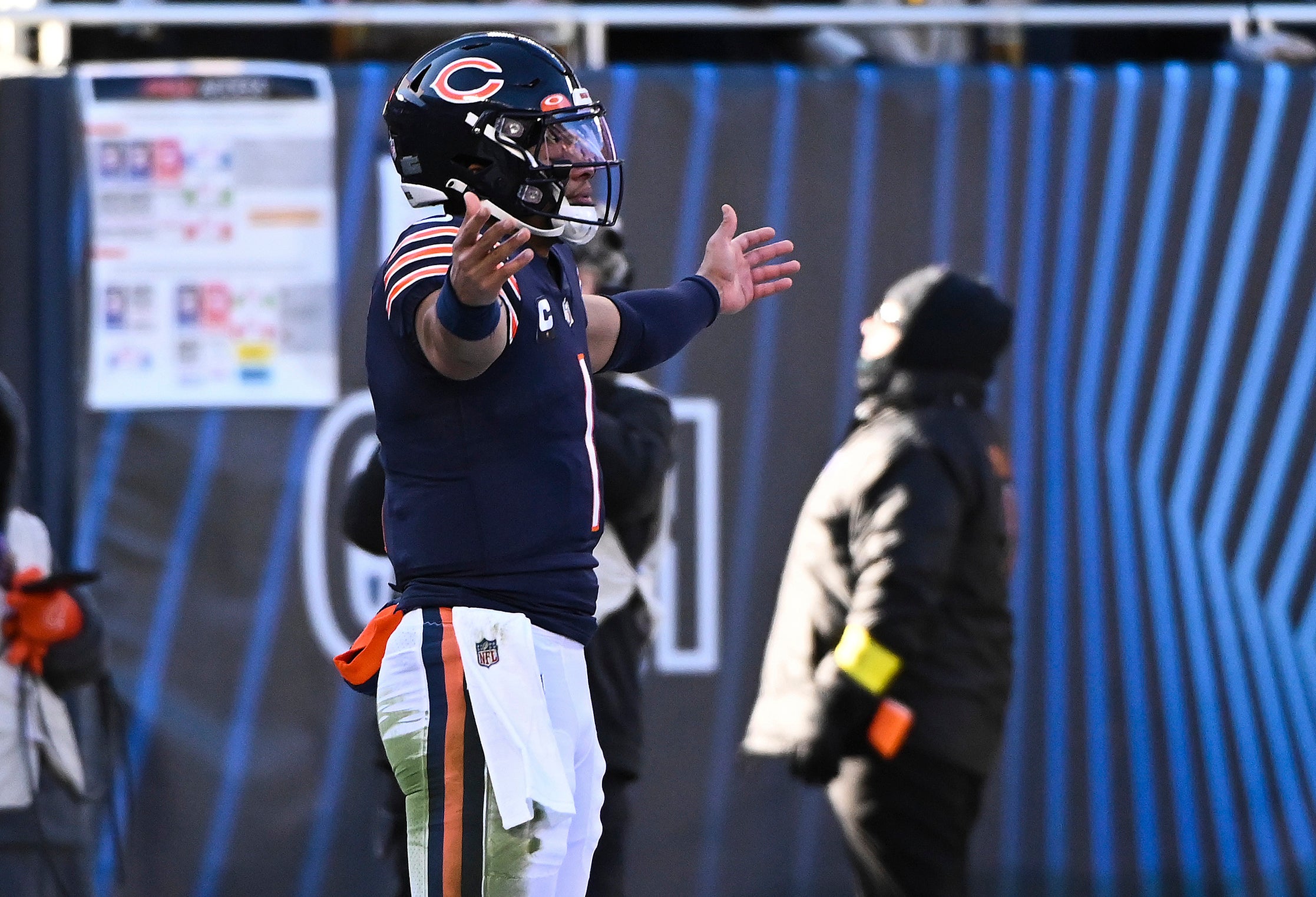 Dec 4, 2022; Chicago, Illinois, USA;  Chicago Bears quarterback Justin Fields (1) celebrates after scoring a touchdown against the Green Bay Packers during the first half at Soldier Field. Mandatory Credit: Matt Marton-USA TODAY Sports