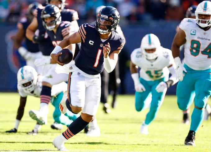 Chicago bears Justin Fields rushing yards touchdowns Miami Dolphins NFC North Green bay Packers Aaron Rodgers Minnesota Vikings Kirk Cousins NFL football league history standings division OC Luke Getsy news