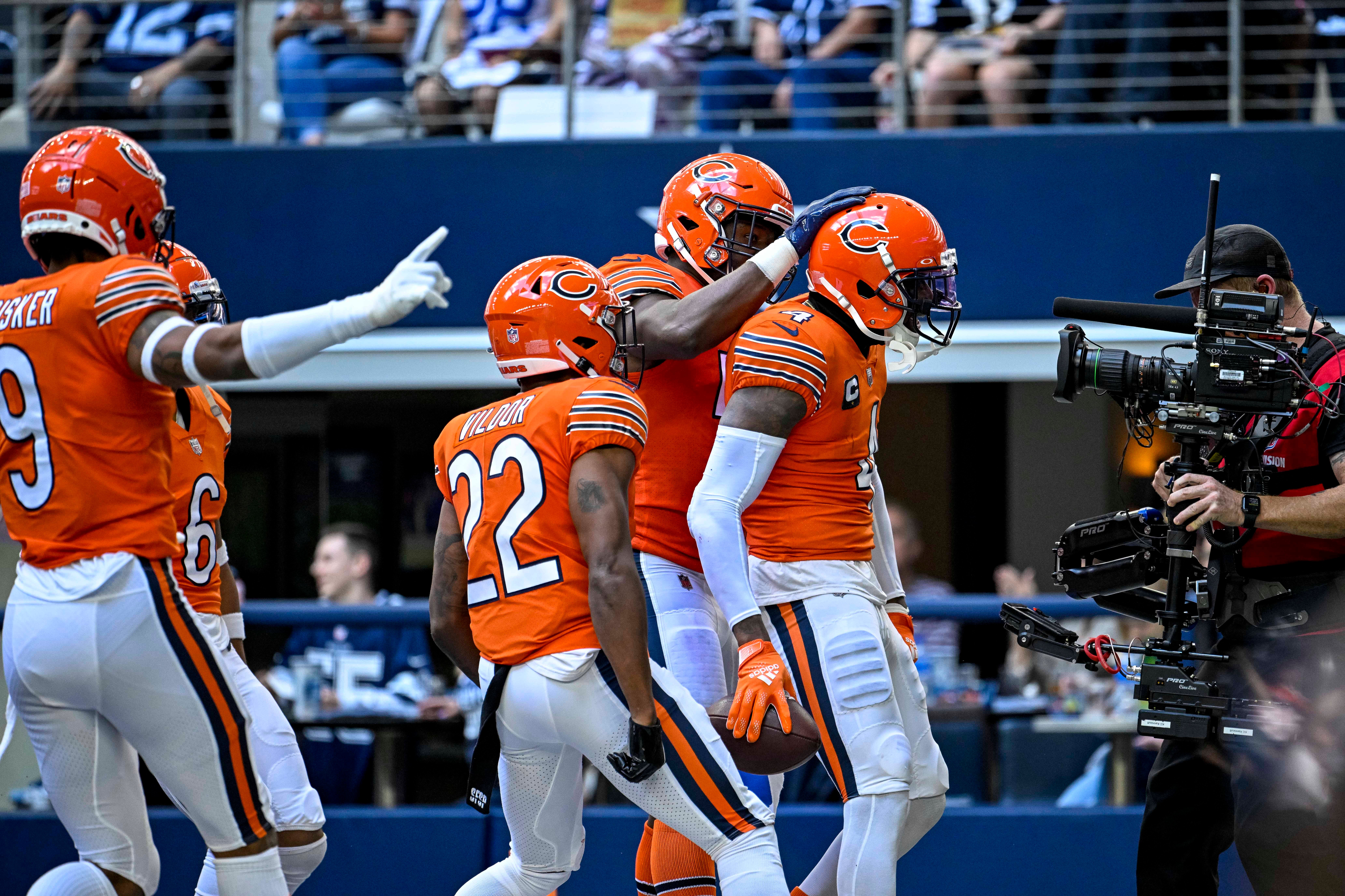 Oct 30, 2022; Arlington, Texas, USA; The Chicago Bears celebrate safety Eddie Jackson (4) intercepting a pass thrown by Dallas Cowboys quarterback Dak Prescott (not pictured) during the second quarter at AT&T Stadium. Mandatory Credit: Jerome Miron-USA TODAY Sports