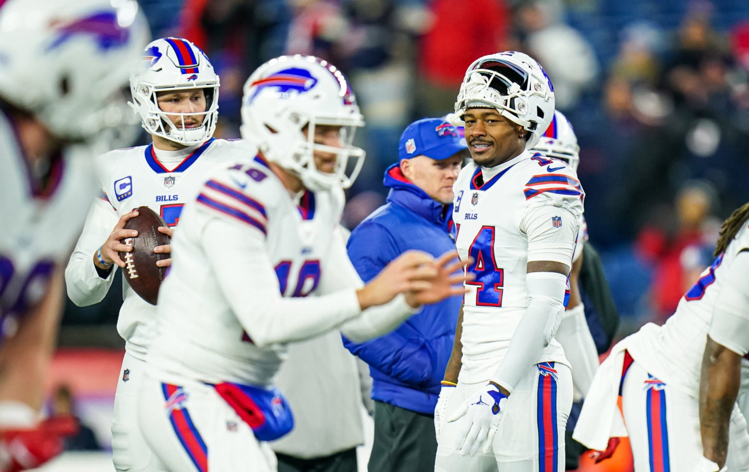 Dec 1, 2022; Foxborough, Massachusetts, USA; Buffalo Bills wide receiver Stefon Diggs (14), quarterback Josh Allen (17) and teammates warm up before the start of the game against the New England Patriots at Gillette Stadium. Mandatory Credit: David Butler II-USA TODAY Sports
