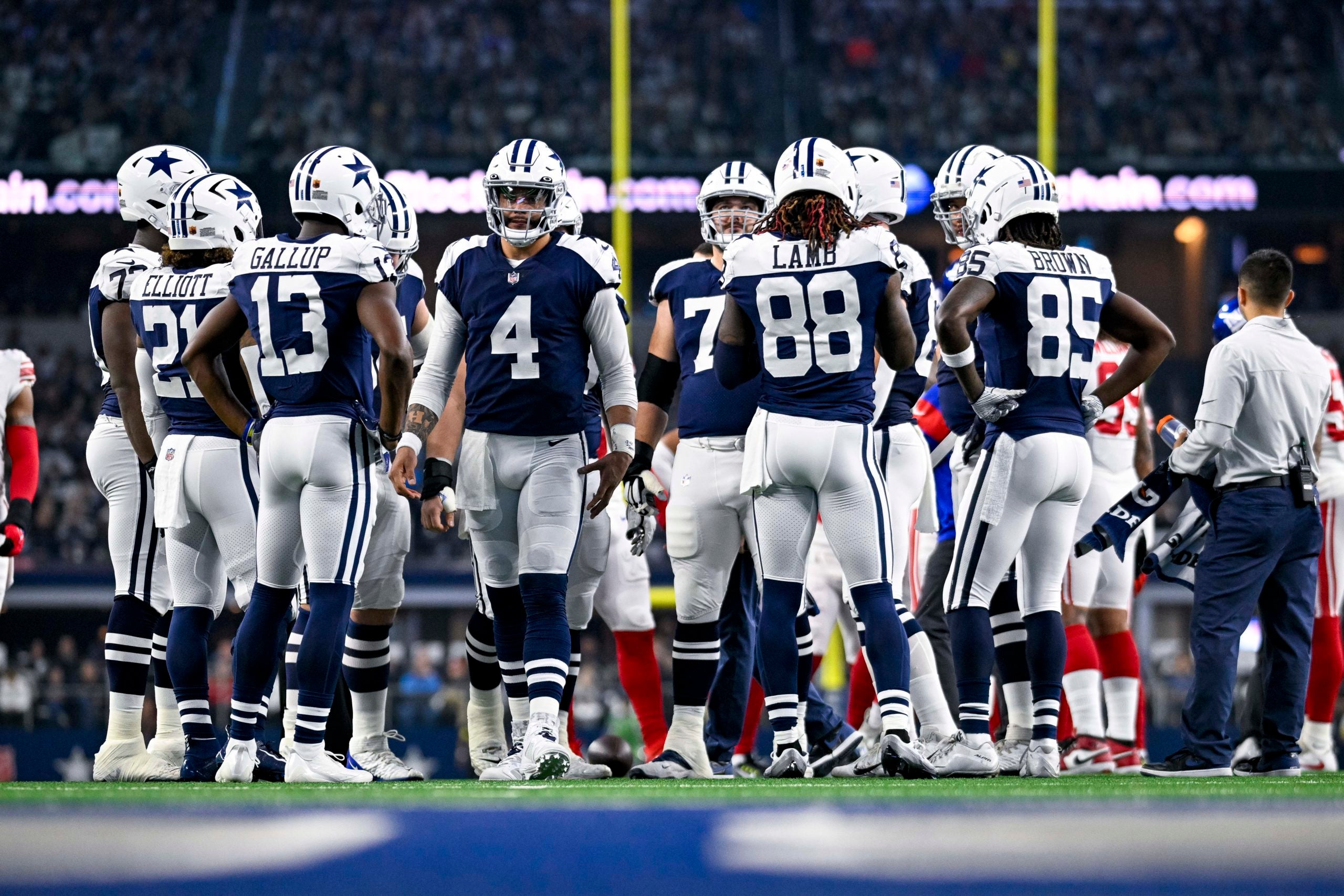 Nov 24, 2022; Arlington, Texas, USA; Dallas Cowboys quarterback Dak Prescott (4) and the offense prepares to face the New York Giants during the first quarter at AT&T Stadium. Mandatory Credit: Jerome Miron-USA TODAY Sports
