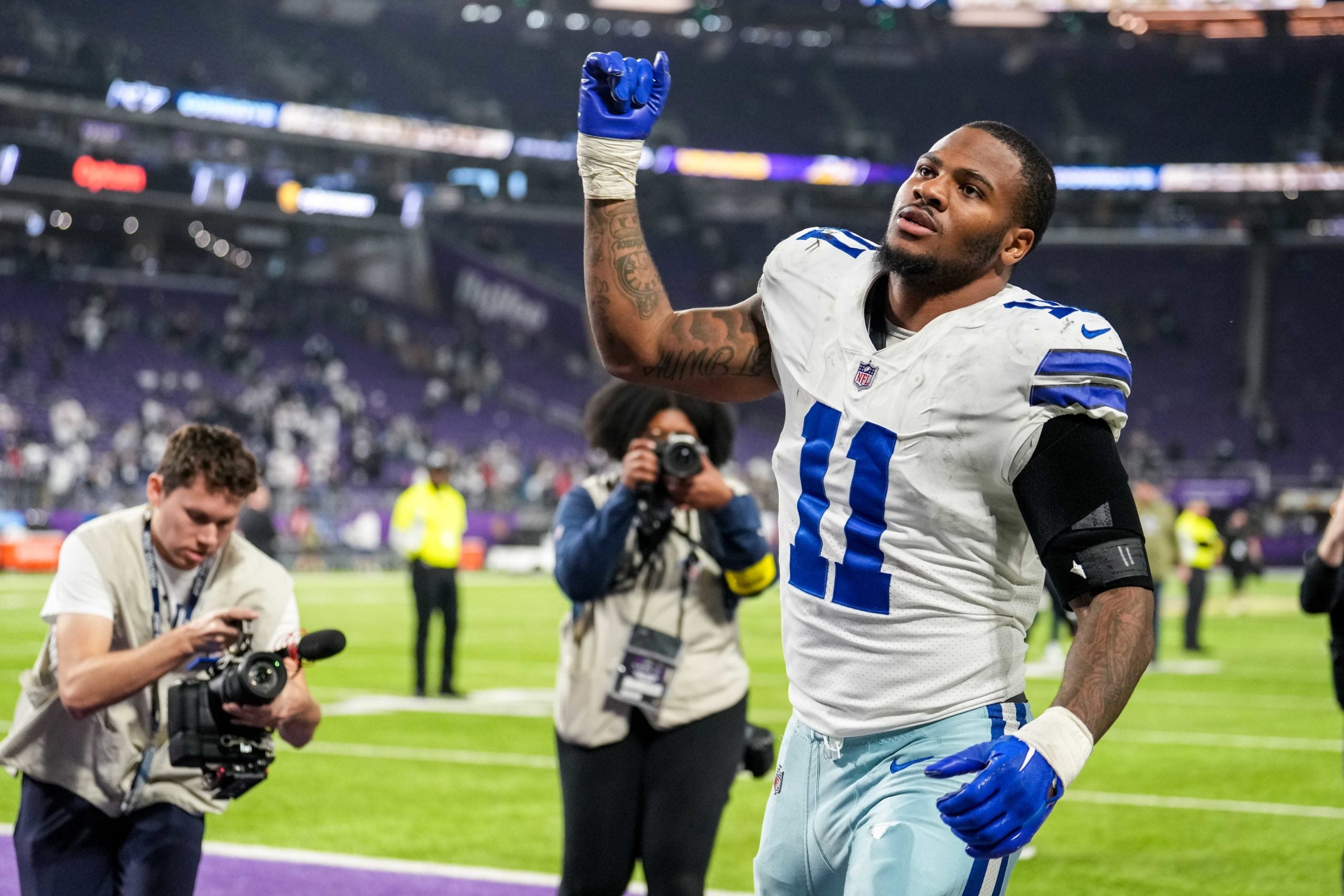 Nov 20, 2022; Minneapolis, Minnesota, USA; Dallas Cowboys linebacker Micah Parsons (11) looks on following the game against the Minnesota Vikings at U.S. Bank Stadium. Mandatory Credit: Brace Hemmelgarn-USA TODAY Sports