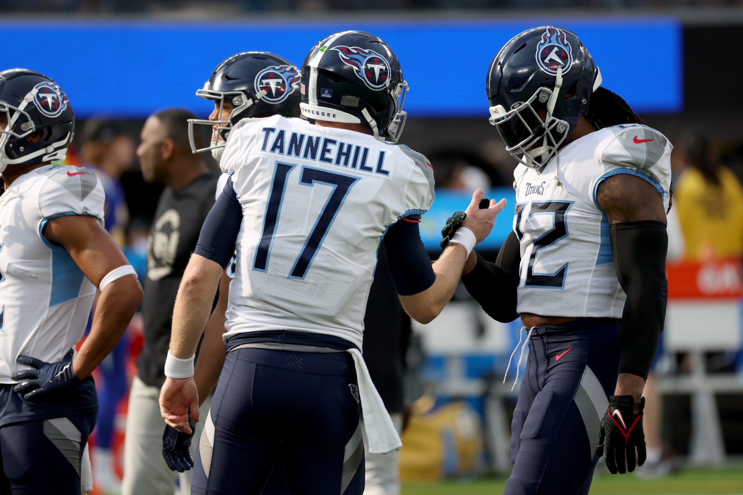 Dec 18, 2022; Inglewood, California, USA;  Tennessee Titans quarterback Ryan Tannehill (17) and running back Derrick Henry (22) shake hands before the game against the Los Angeles Chargersat SoFi Stadium. Mandatory Credit: Kiyoshi Mio-USA TODAY Sports