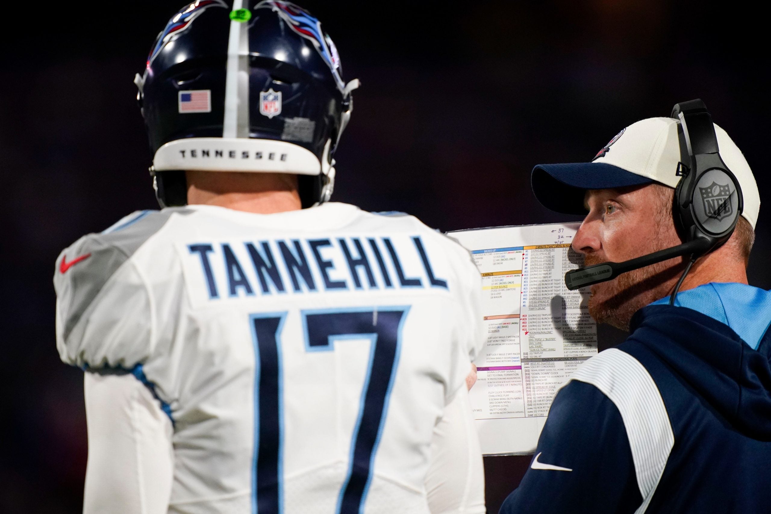 Tennessee Titans offensive coordinator Todd Downing talks to quarterback Ryan Tannehill (17) during the second quarter against the Buffalo Bills at Highmark Stadium Monday, Sept. 19, 2022, in Orchard Park, New York. Nfl Tennessee Titans At Buffalo Bills