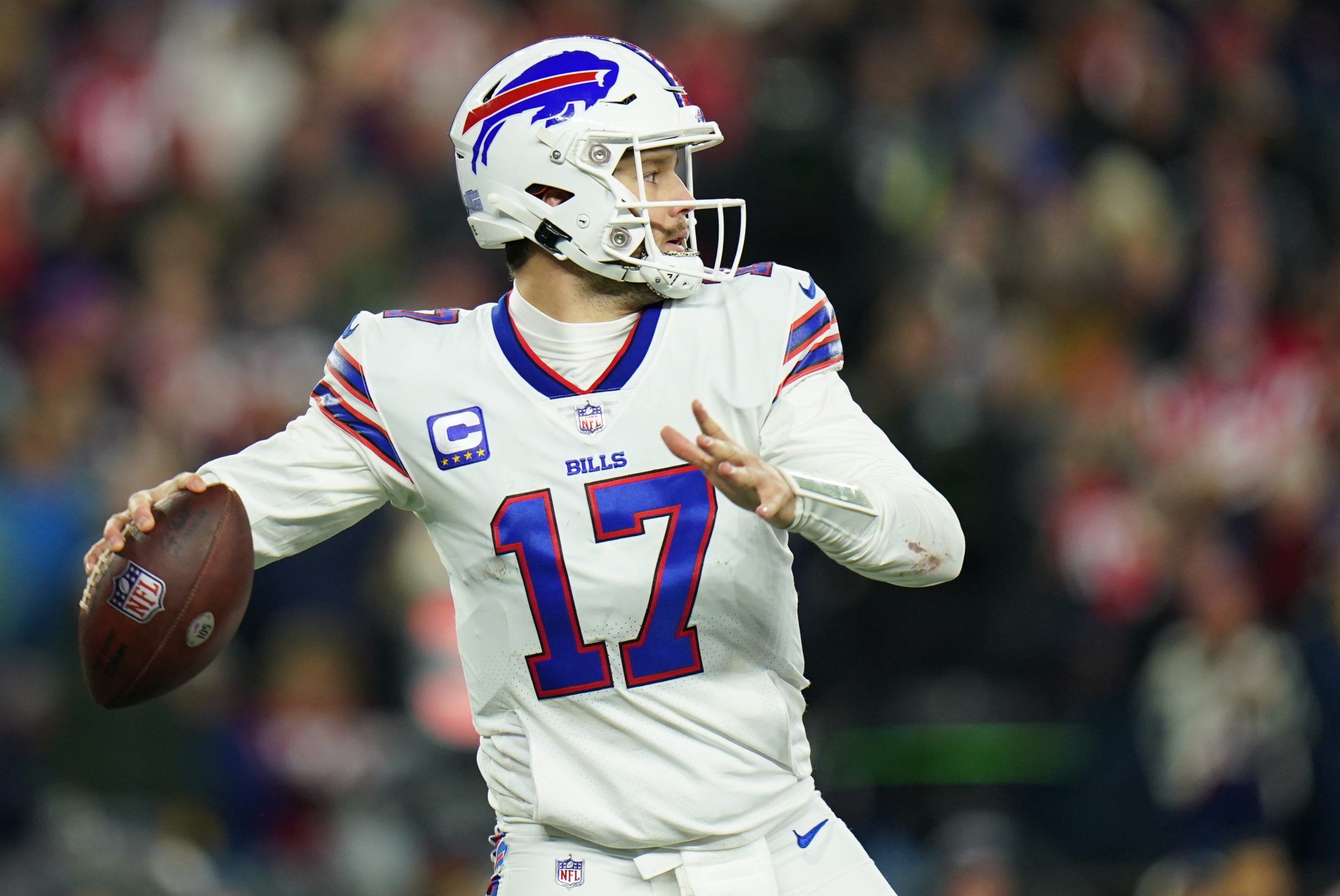 Dec 1, 2022; Foxborough, Massachusetts, USA; Buffalo Bills quarterback Josh Allen (17) throws a pass against the New England Patriots in the second half at Gillette Stadium. Mandatory Credit: David Butler II-USA TODAY Sports