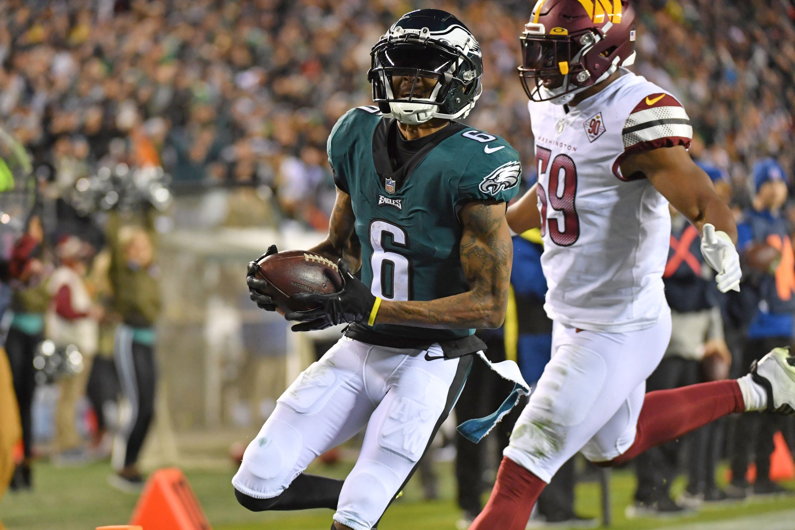 Nov 14, 2022; Philadelphia, Pennsylvania, USA; Philadelphia Eagles wide receiver DeVonta Smith (6) scores a touchdown against the Washington Commanders during the fourth quarter at Lincoln Financial Field. Mandatory Credit: Eric Hartline-USA TODAY Sports