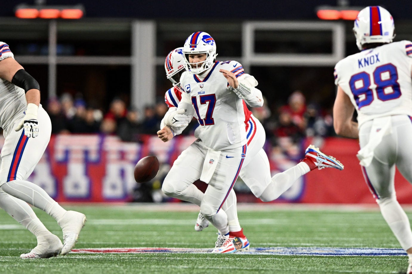 Dec 1, 2022; Foxborough, Massachusetts, USA; Buffalo Bills quarterback Josh Allen (17) fumbles the ball after a sack by New England Patriots linebacker Josh Uche (55) during the first half at Gillette Stadium. Mandatory Credit: Brian Fluharty-USA TODAY Sports