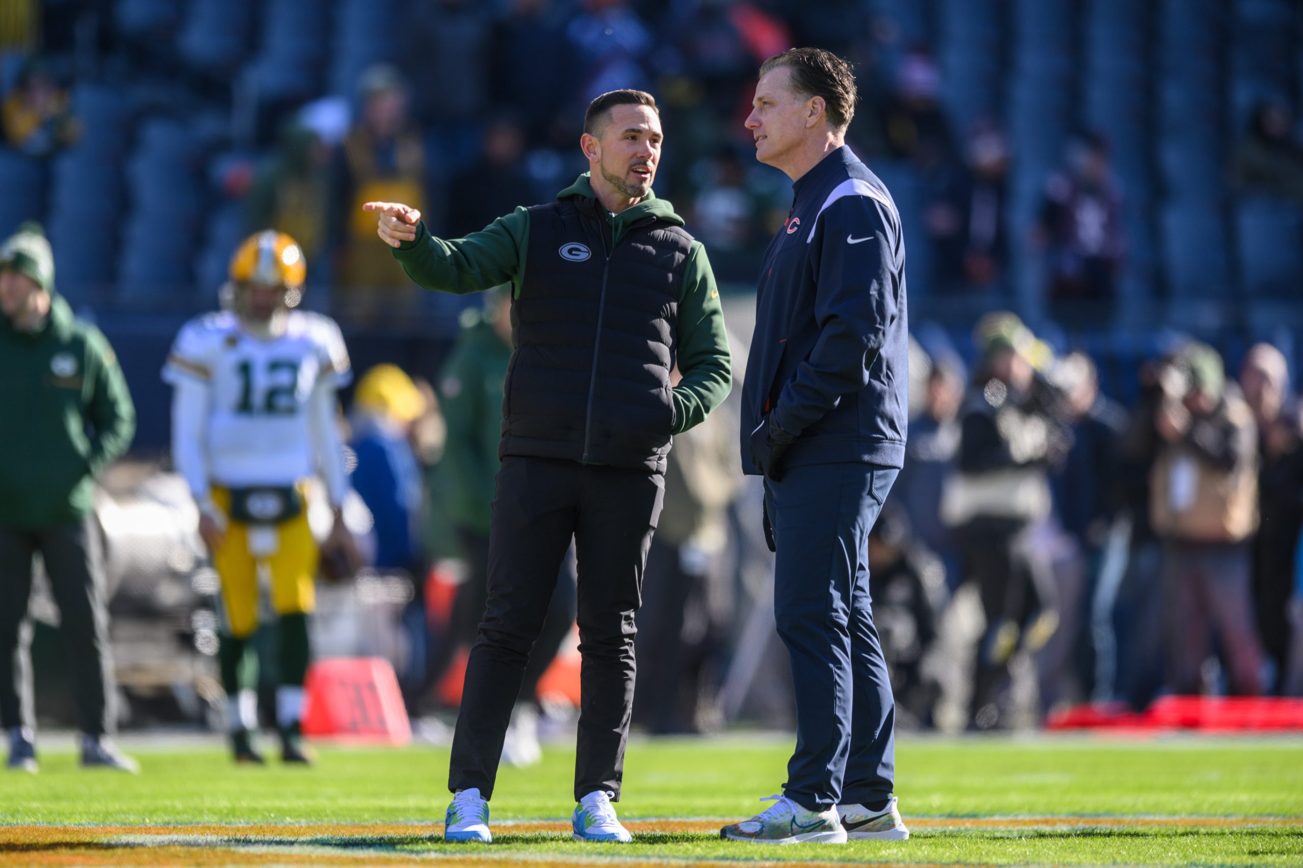 Dec 4, 2022; Chicago, Illinois, USA; Green Bay Packers head coach Matt LaFleur and Chicago Bears head coach Matt Eberflus talk before their game at Soldier Field. Mandatory Credit: Daniel Bartel-USA TODAY Sports