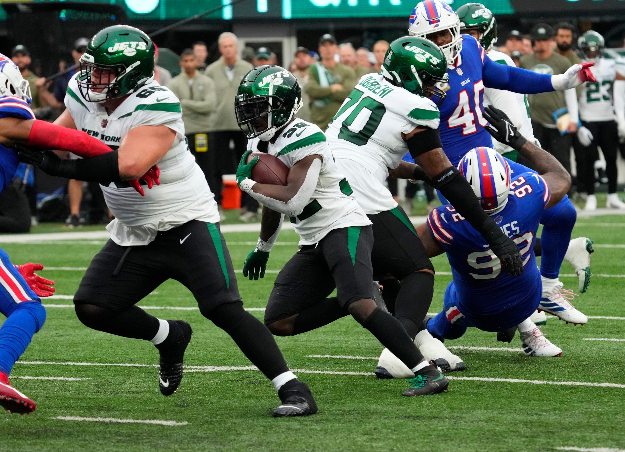 Nov 6, 2022; East Rutherford, NJ, USA; New York Jets running back Michael Carter (32) scores a first half touchdown against the Buffalo Bills at MetLife Stadium. Mandatory Credit: Robert Deutsch-USA TODAY Sports
