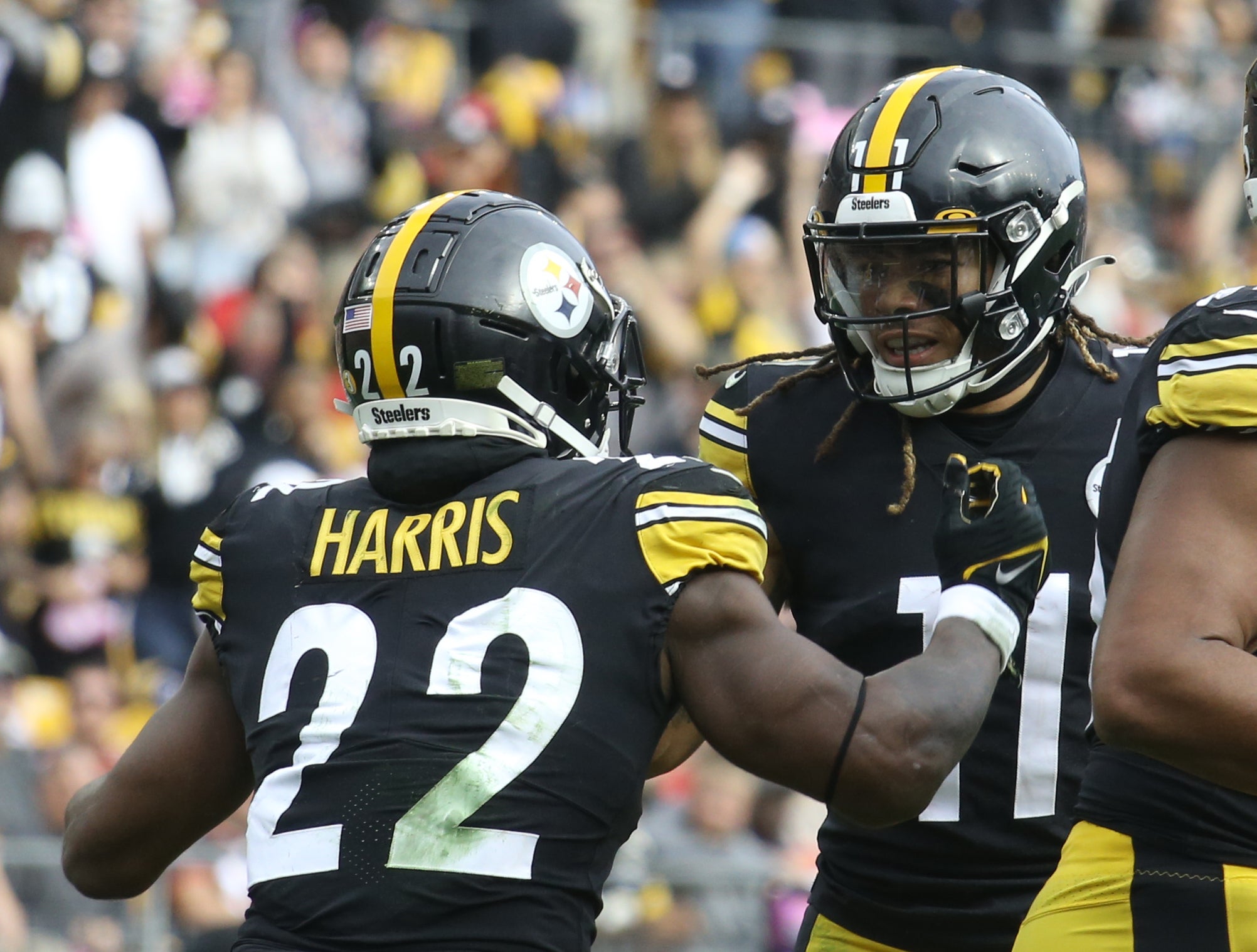 Oct 16, 2022; Pittsburgh, Pennsylvania, USA;  Pittsburgh Steelers running back Najee Harris (22) congratulates wide receiver Chase Claypool (11) on his touchdown against the Tampa Bay Buccaneers during the fourth quarter at Acrisure Stadium. Pittsburgh won 20-18. Mandatory Credit: Charles LeClaire-USA TODAY Sports