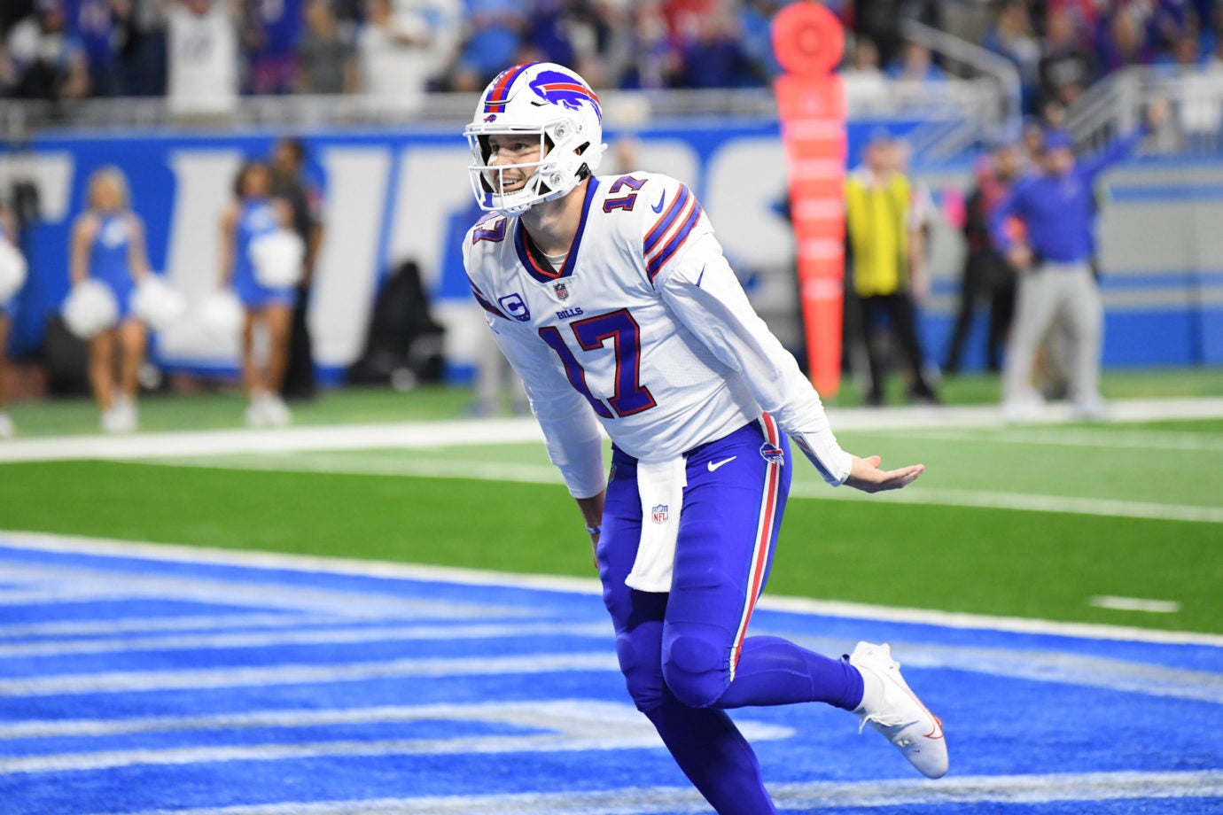 Nov 24, 2022; Detroit, Michigan, USA; Buffalo Bills quarterback Josh Allen (17) celebrates after scoring a touchdown against the Detroit Lions in the second quarter at Ford Field. Mandatory Credit: Lon Horwedel-USA TODAY Sports