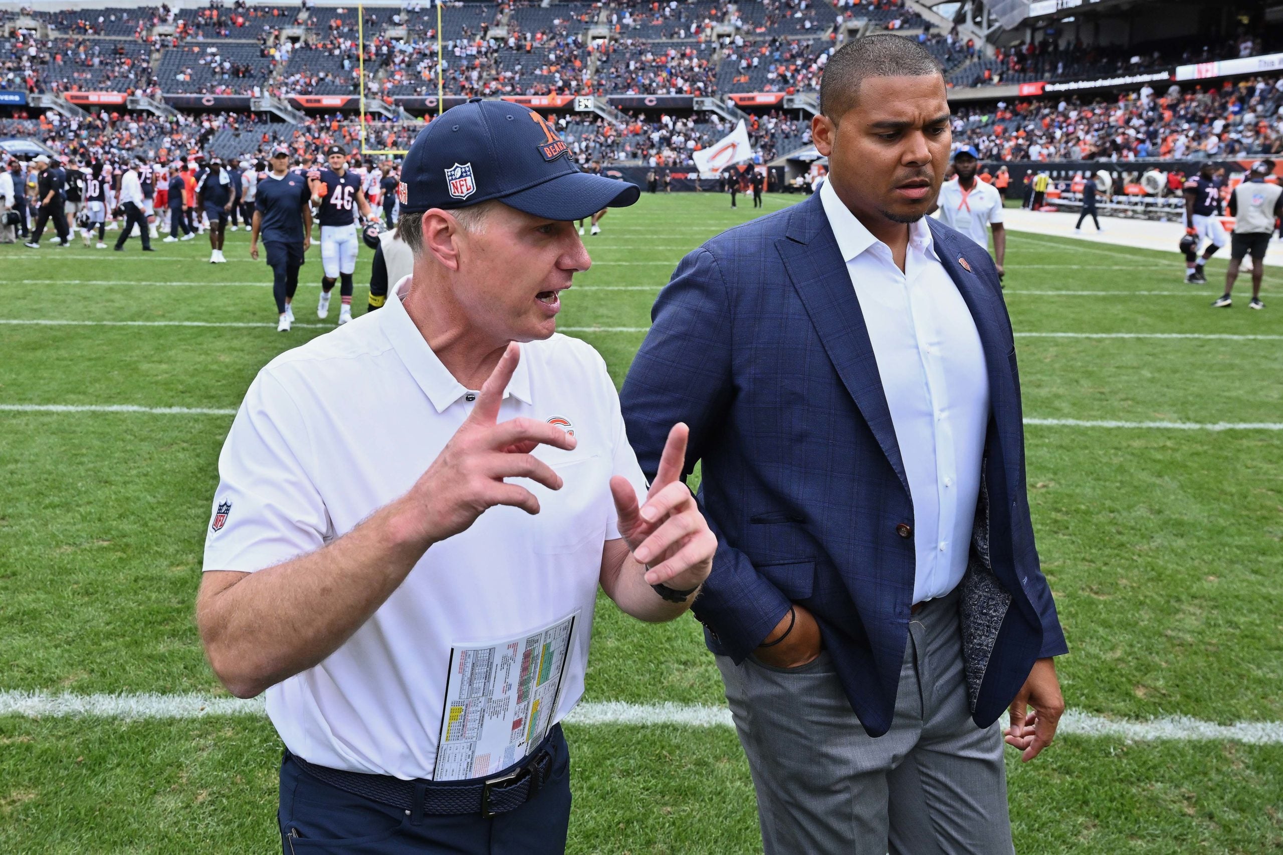 Aug 13, 2022; Chicago, Illinois, USA;  Chicago Bears head coach Matt Eberflus, left, and general manager Ryan Poles walk off the field after the Bears defeated the Kansas City Chiefs 19-14 at Soldier Field. Mandatory Credit: Jamie Sabau-USA TODAY Sports