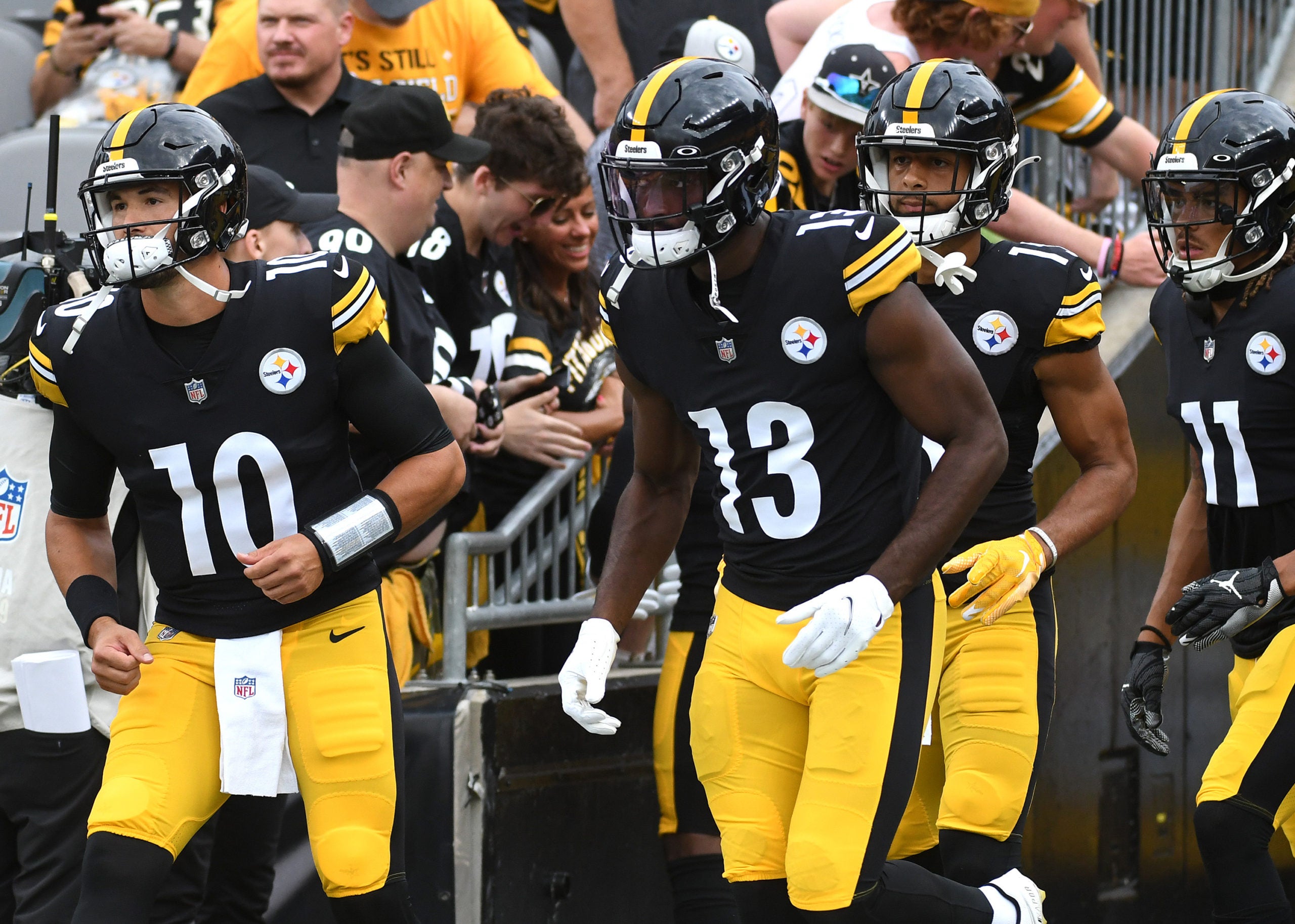 Aug 13, 2022; Pittsburgh, Pennsylvania, USA;  Pittsburgh Steelers quarterback Mitch Trubisky (10) and wide receivers Miles Boykin (13) and Calvin Austin III (19) and Chase Claypool (11) take the field before a game against the Seattle Seahawks at Acrisure Stadium. Mandatory Credit: Philip G. Pavely-USA TODAY Sports