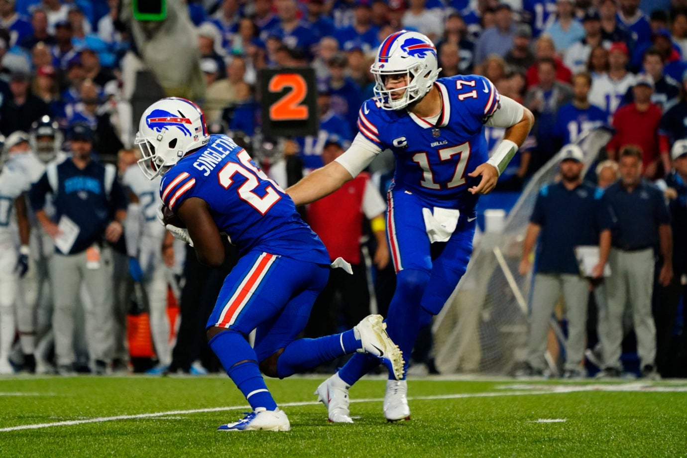 Sep 19, 2022; Orchard Park, New York, USA; Buffalo Bills quarterback Josh Allen (17) hands off to Buffalo Bills running back Devin Singletary (26) during the first half against the Tennesse Titans at Highmark Stadium. Mandatory Credit: Gregory Fisher-USA TODAY Sports
