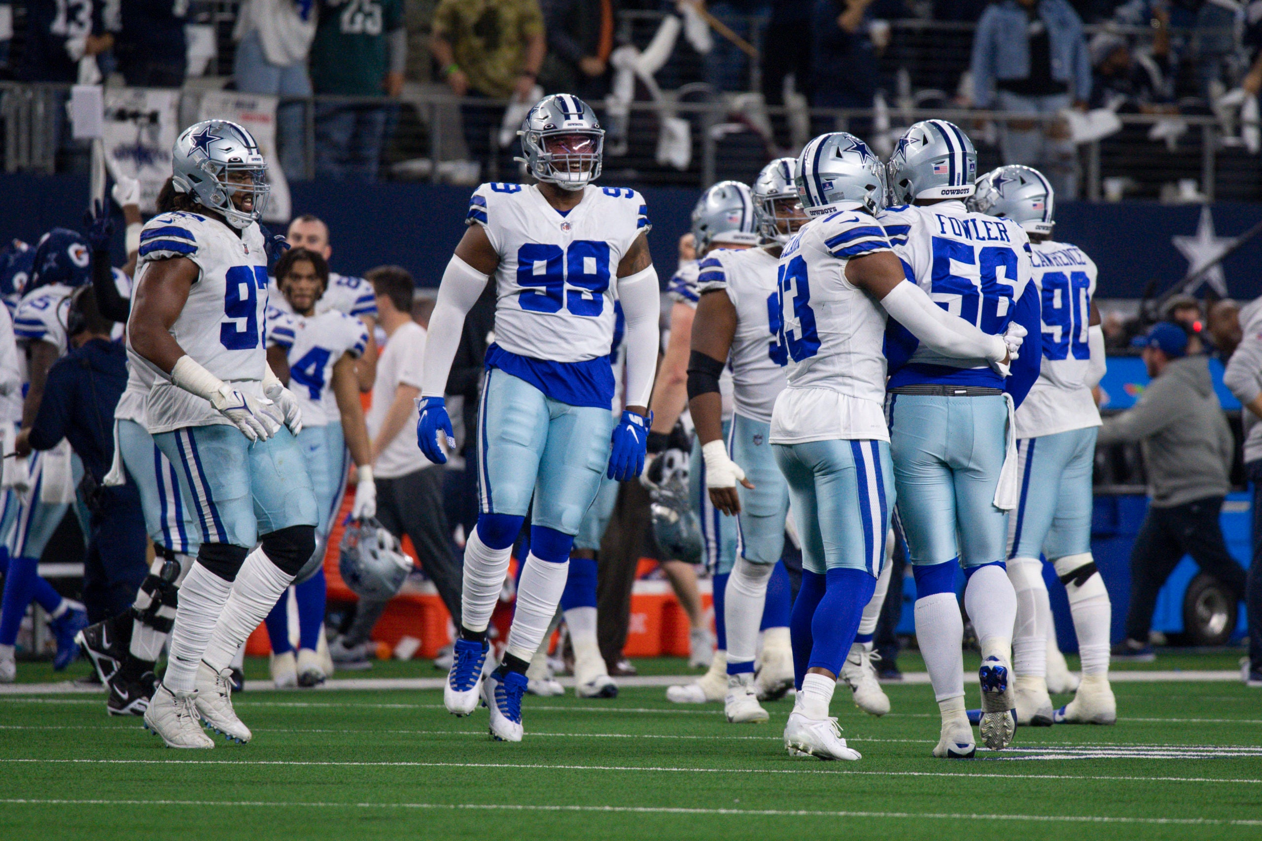 Dec 24, 2022; Arlington, Texas, USA; The Dallas Cowboys defense celebrate after their fourth down stop against the Philadelphia Eagles during the second half at AT&T Stadium. Mandatory Credit: Jerome Miron-USA TODAY Sports