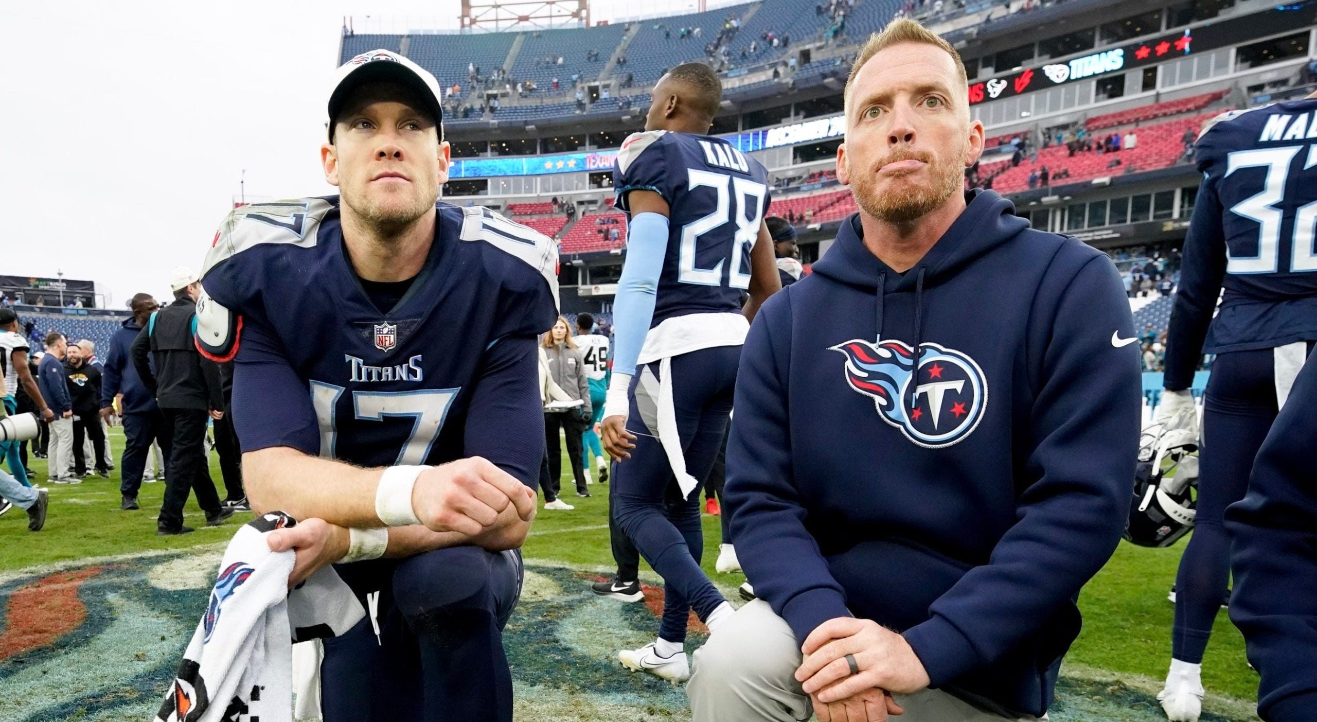 Tennessee Titans quarterback Ryan Tannehill (17) kneels with offensive coordinator Todd Downing after losing to the Jacksonville Jaguars at Nissan Stadium Sunday, Dec. 11, 2022, in Nashville, Tenn. Nfl Jacksonville Jaguars At Tennessee Titans