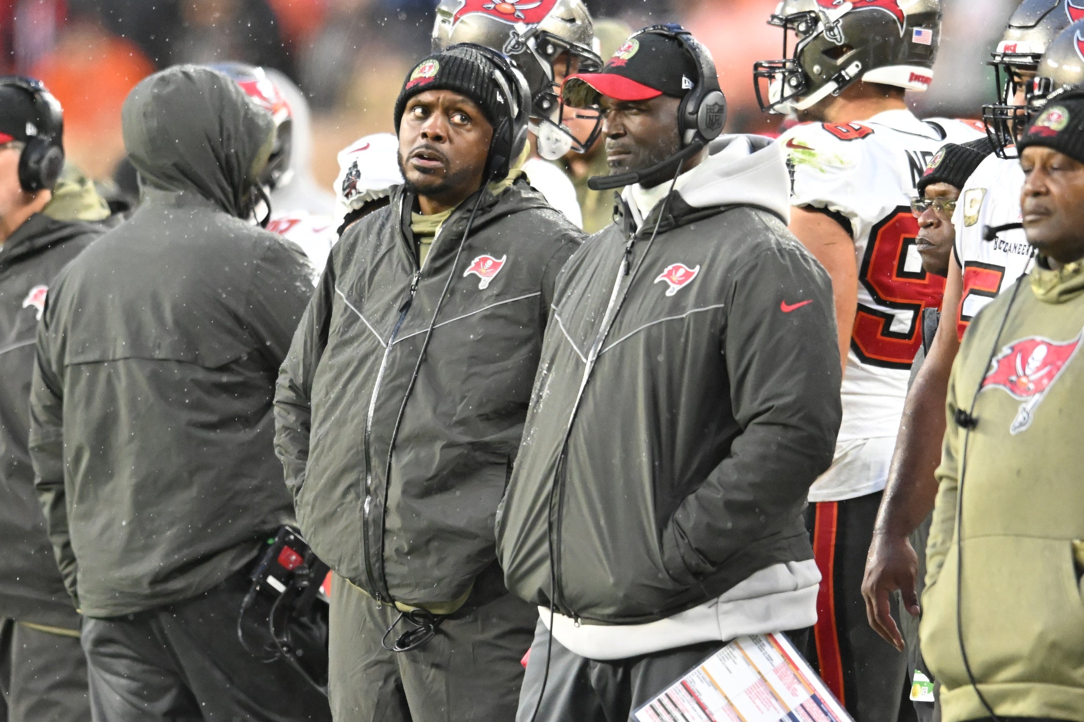 Nov 27, 2022; Cleveland, Ohio, USA; Tampa Bay Buccaneers head coach Todd Bowles, middle, watches from the sidelines during overtime against the Cleveland Browns at FirstEnergy Stadium. Mandatory Credit: Ken Blaze-USA TODAY Sports