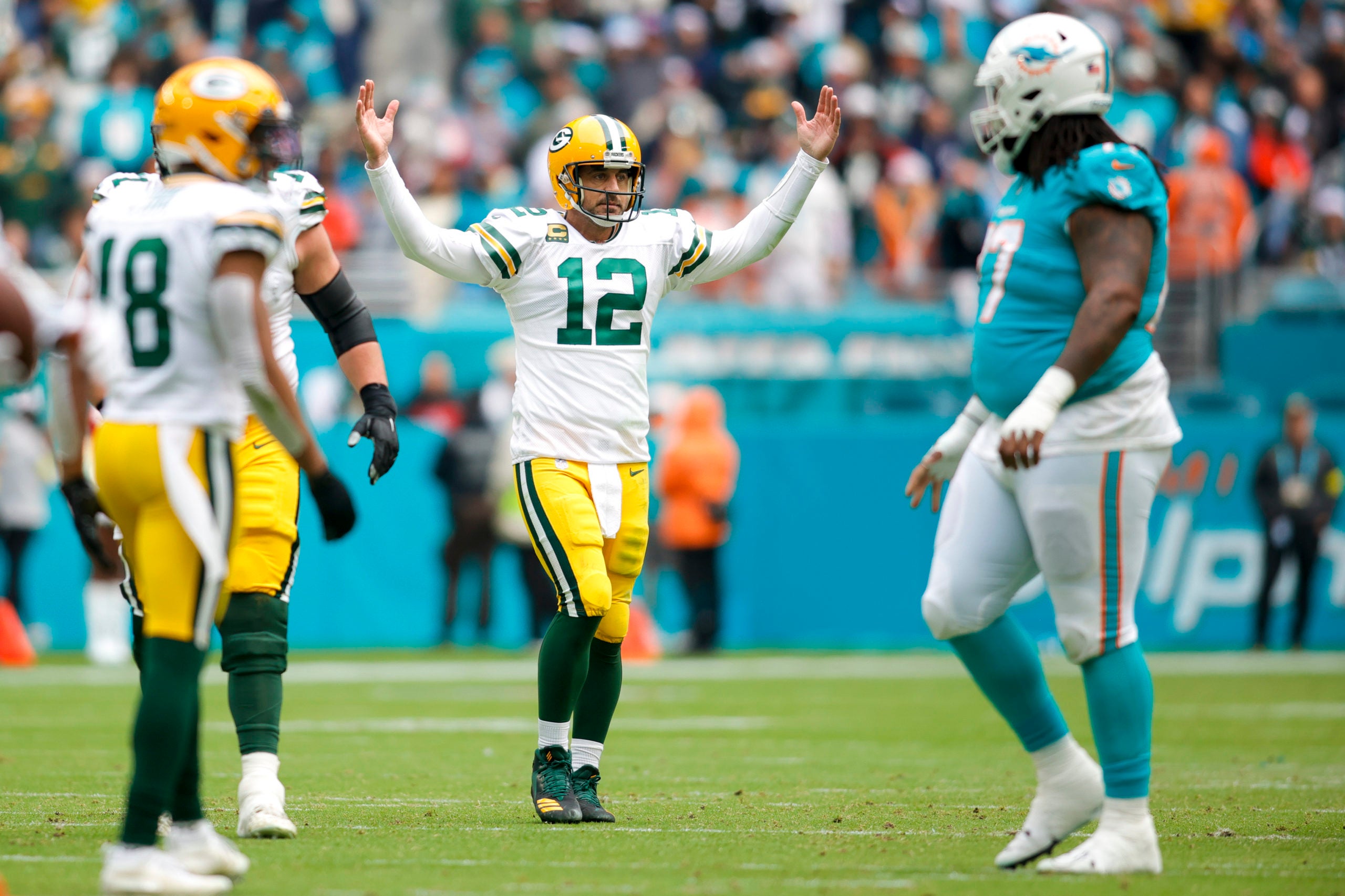 Dec 25, 2022; Miami Gardens, Florida, USA; Green Bay Packers quarterback Aaron Rodgers (12) reacts from the field during the second quarter against the Miami Dolphins at Hard Rock Stadium. Mandatory Credit: Sam Navarro-USA TODAY Sports