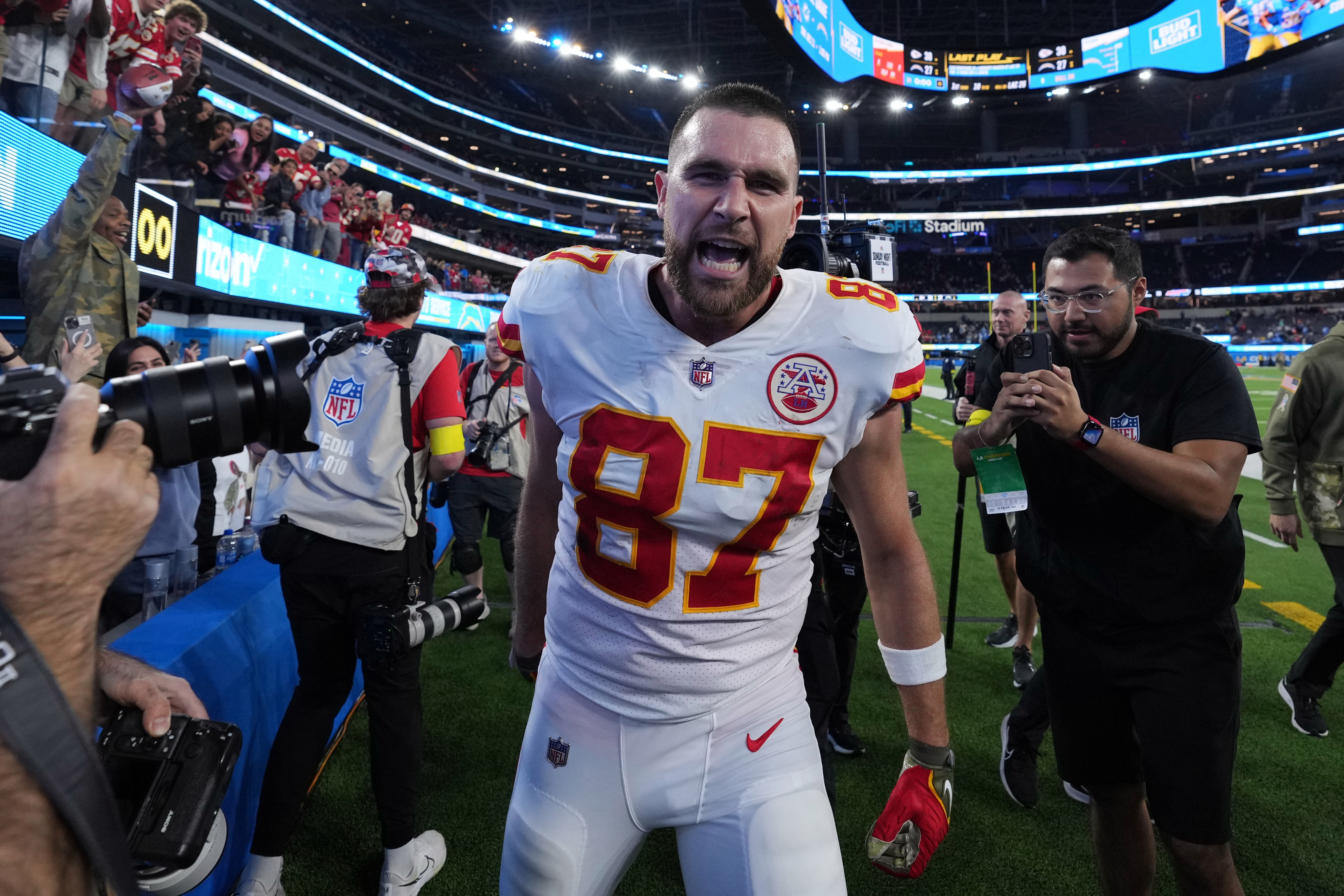 Nov 20, 2022; Inglewood, California, USA; Kansas City Chiefs tight end Travis Kelce (87) celebrates at the end of the game against the Los Angeles Chargers at SoFi Stadium. Mandatory Credit: Kirby Lee-USA TODAY Sports