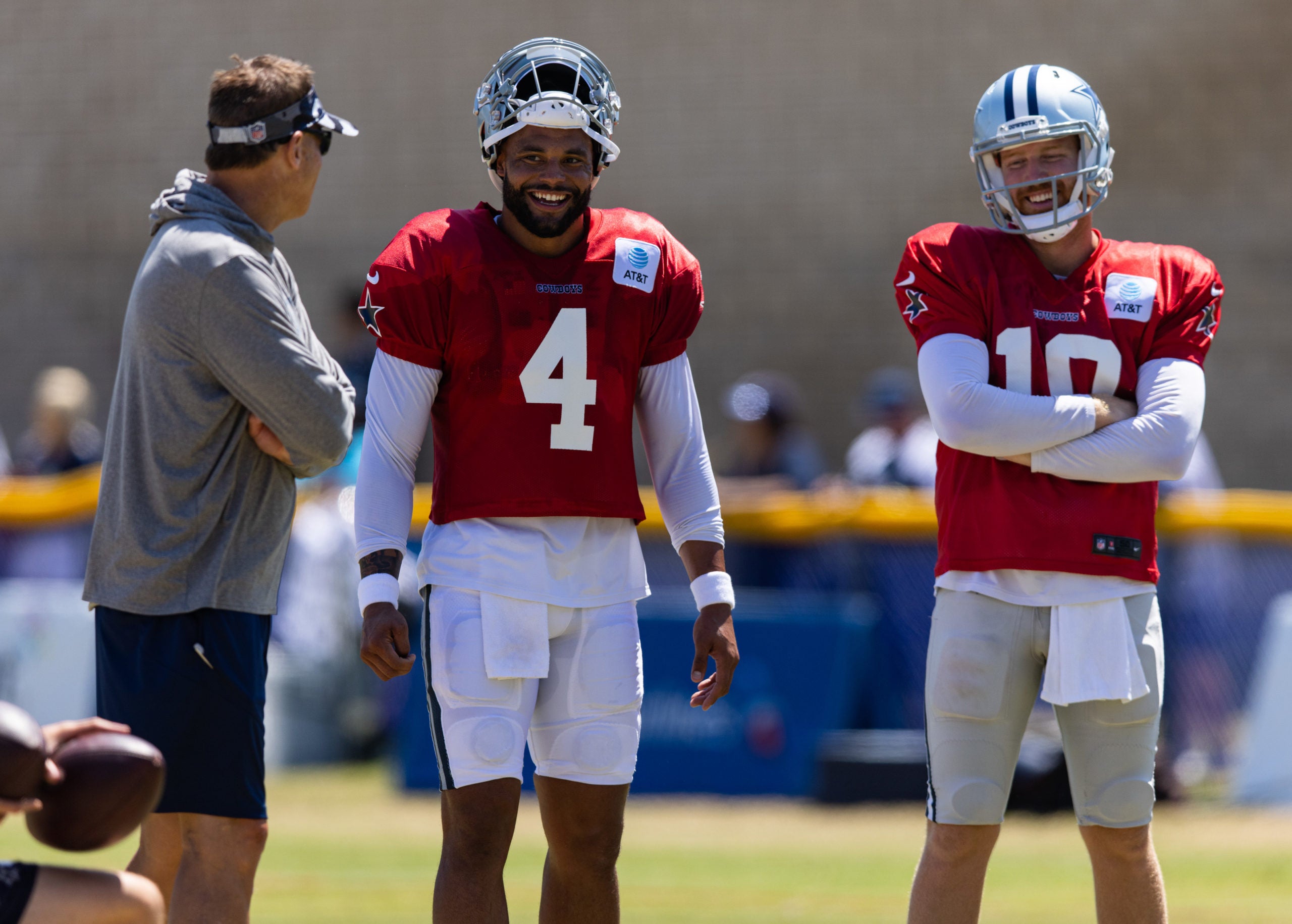 Aug 2, 2022; Oxnard, CA, USA; Dallas Cowboys quarterback Dak Prescott (4) and quarterback Cooper Rush (10) during training camp at River Ridge Playing Fields in Oxnard, California. Mandatory Credit: Jason Parkhurst-USA TODAY Sports