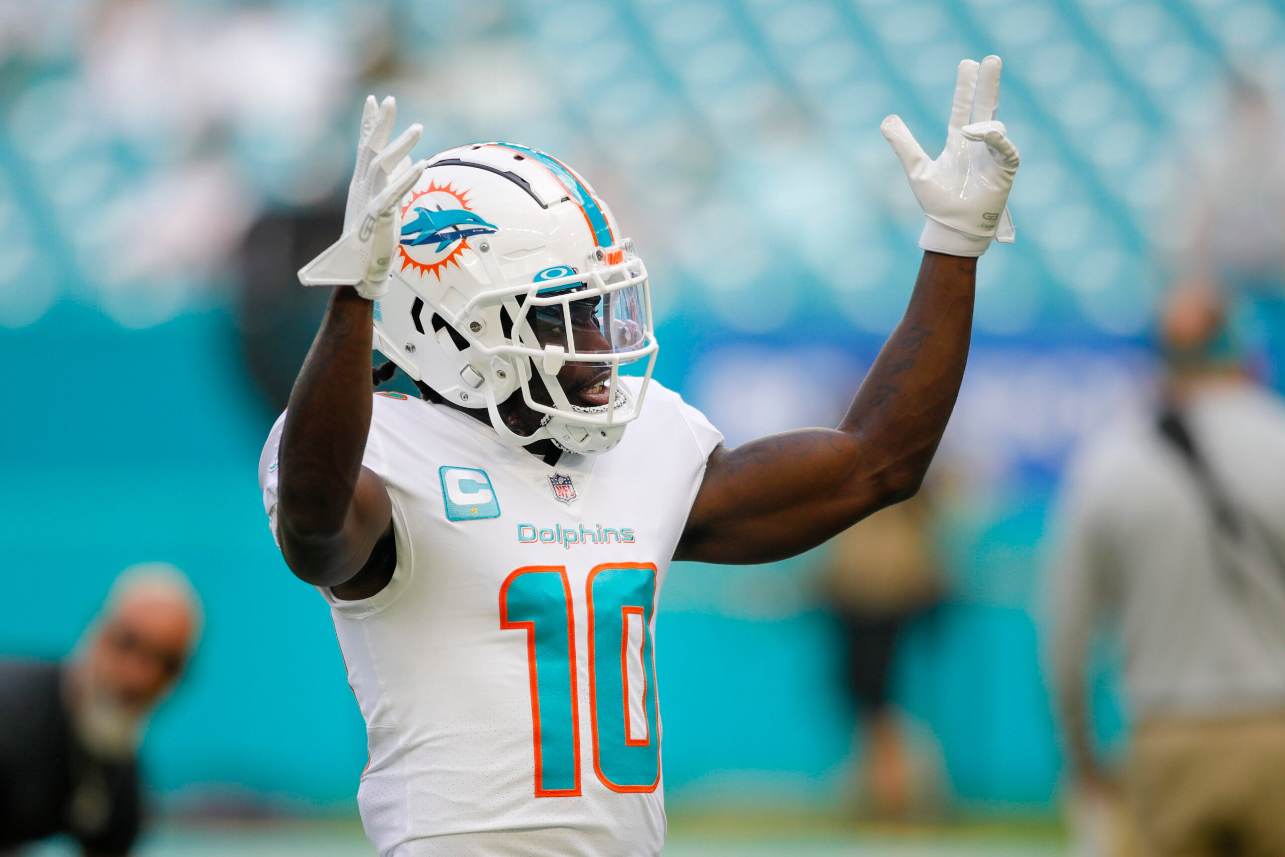 Nov 27, 2022; Miami Gardens, Florida, USA; Miami Dolphins wide receiver Tyreek Hill (10) reacts during warmups prior to the game against the Houston Texans at Hard Rock Stadium. Mandatory Credit: Sam Navarro-USA TODAY Sports